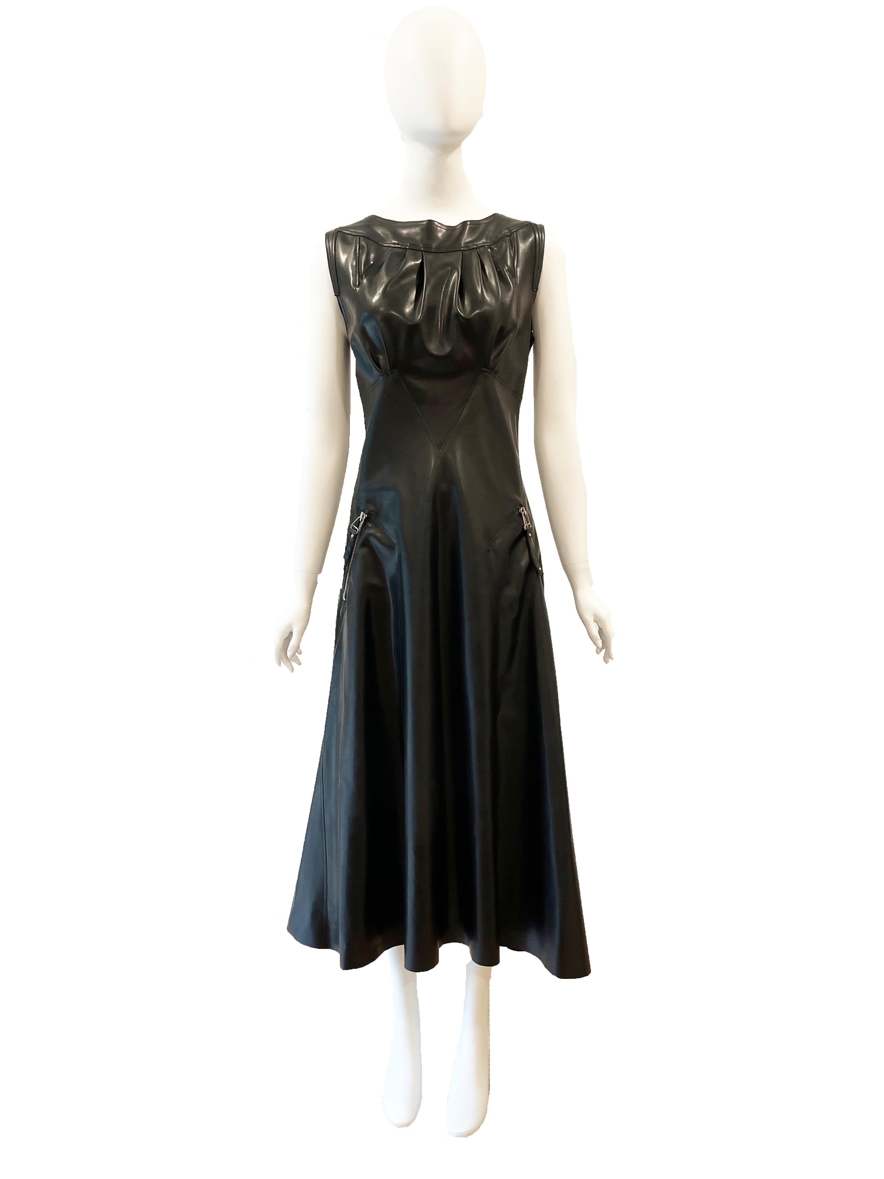 1990s Jean Paul Gaultier Black Vinyl Buckle Dress 
Can be worn with buckles in front or back. 
Condition: Excellent

Fits current Size M / L 
US 10 / IT 44
