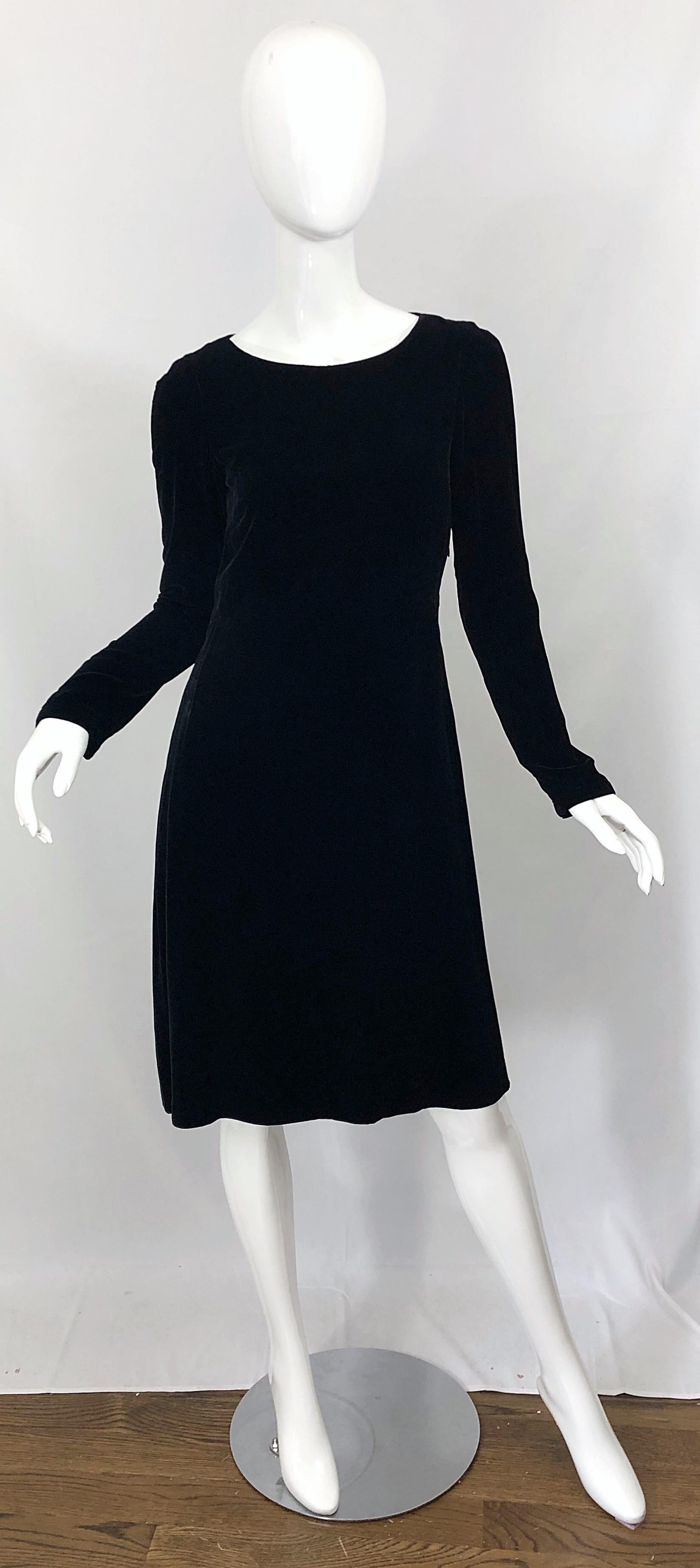 Chic early 90s JIL SANDER black lightweight velvet minimalist long sleeve dress! Features a luxurious silk and rayon blended lightweight velvet fabric. Flattering and easy fit. Tailored bodice with a babydoll like silhouette. Hidden zipper up the