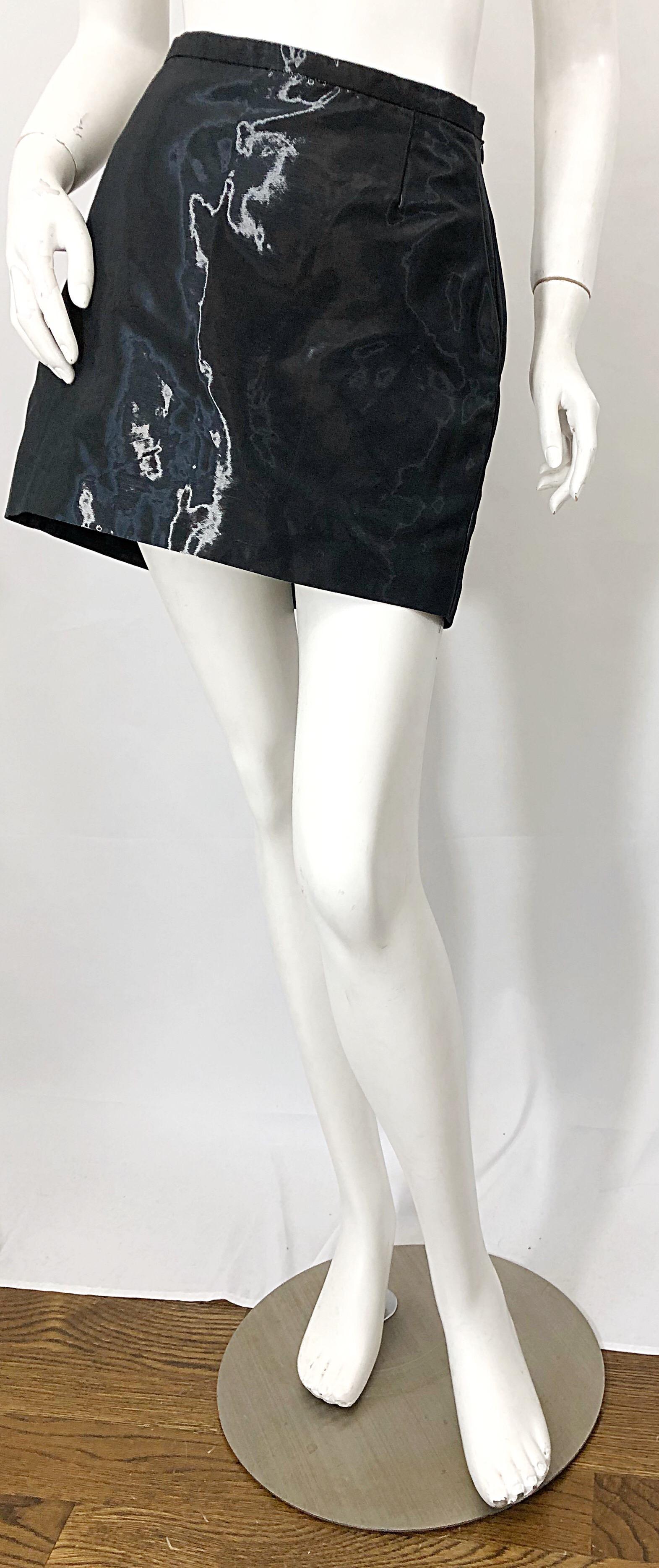 1990s JIL SANDER gray / black metallic minimalist mini skirt from her exclusive Tailor Made line. The line was considered a step up from Sander's already luxury main line. This skirt isn't just your basic mini skirt; it takes on a different sheen /