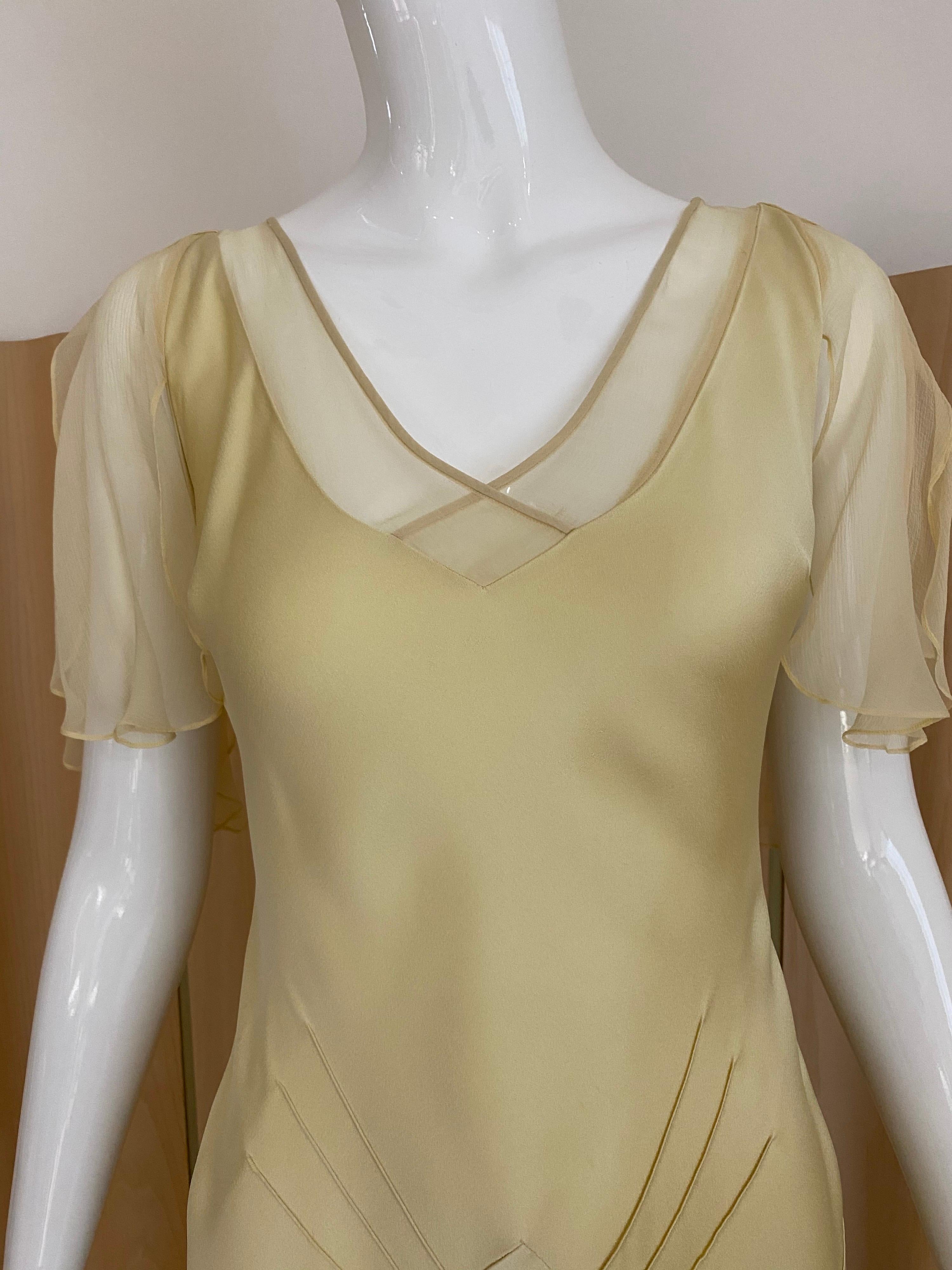 Vintage 1990s John Galliano cream silk charmeuse bias cut dress with flutter sleeves.
Perfect for wedding dress . fit size US 2/4