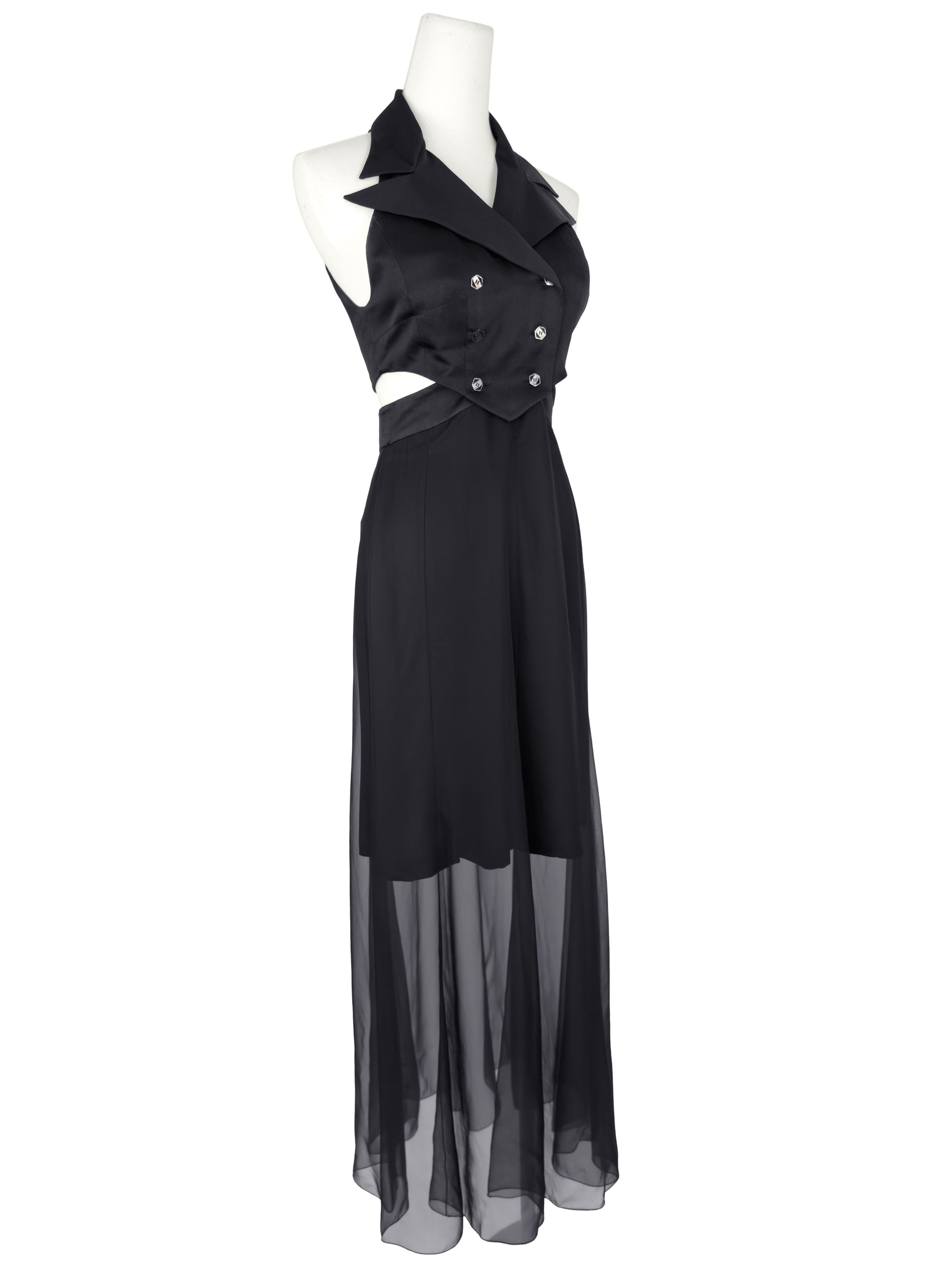 Super unique piece, this early Karl Lagerfeld from the 1990s is sexy and sophisticated. The skirt is made up of silk pencil skirt under a long silk chiffon floor length skirt. The skirt is fitted with a very high waistline that is trimmed in silk