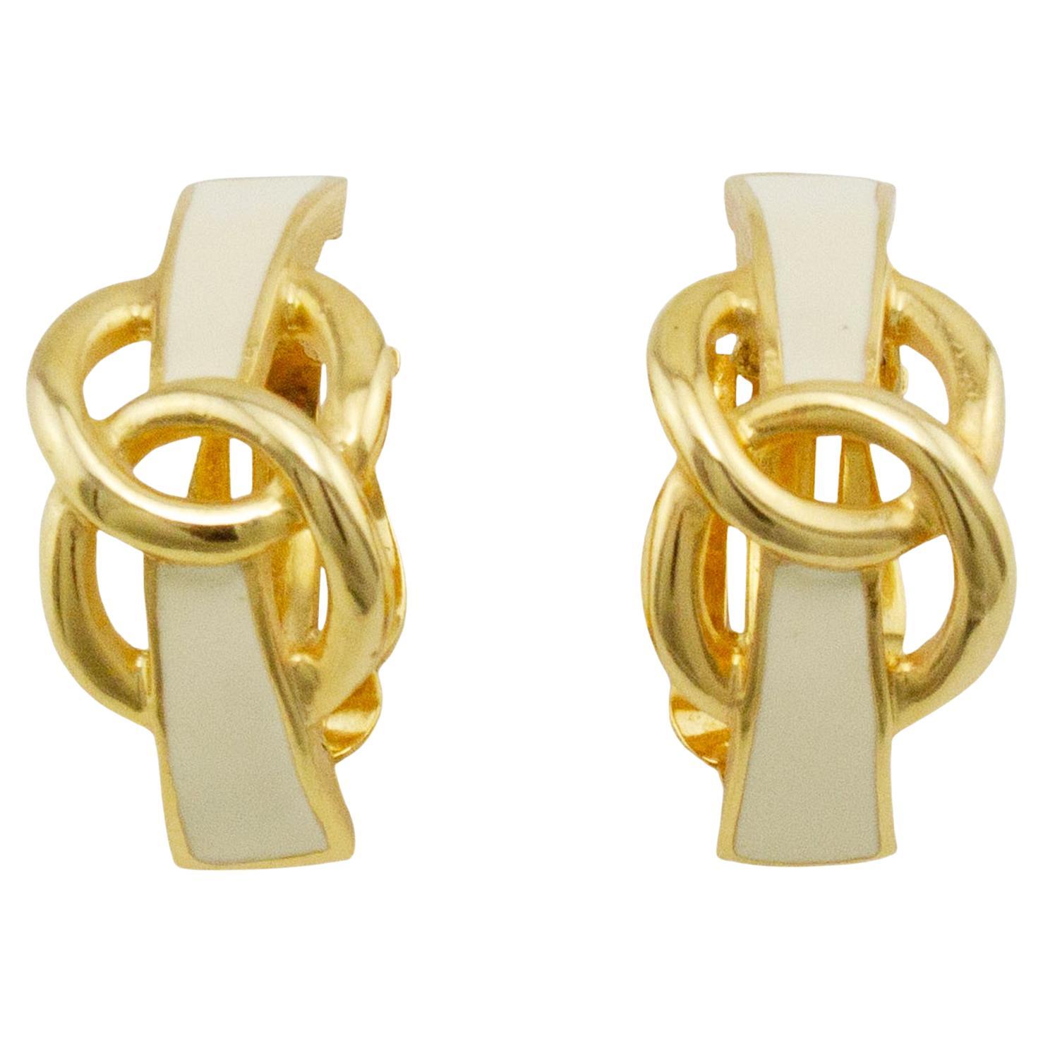 1990s Kenneth Jay Lane Enamel and Gold Twisted Circles Clip On Earrings For Sale
