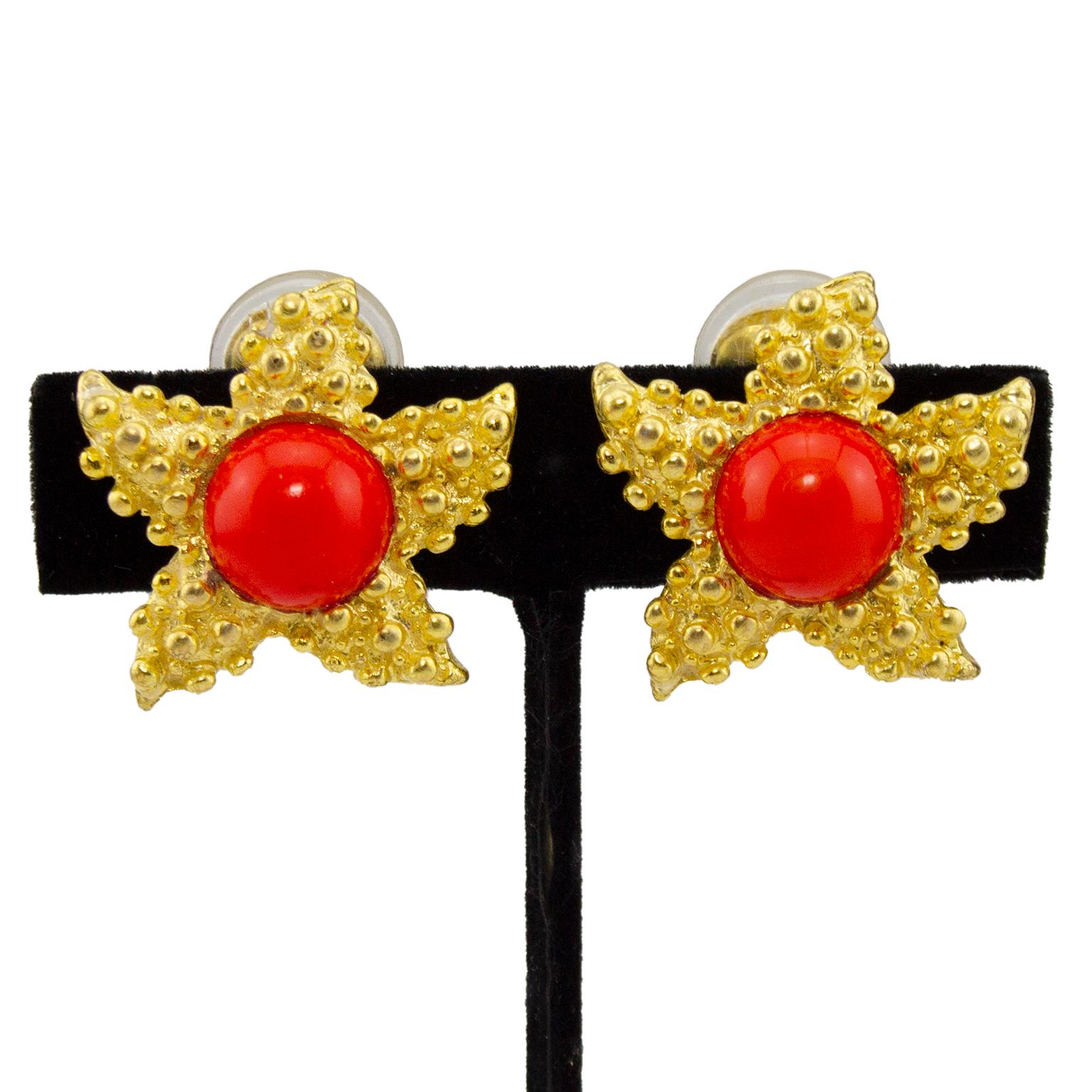 Beautiful Kenneth Jay Lane earrings from the 1990s. Gold tone textured starfish with faux coral cabochons centres. Clip ons with plastic backings for comfort on ears. ©KJL marking on backs. Perfect for summer evenings or tropical holidays! Excellent