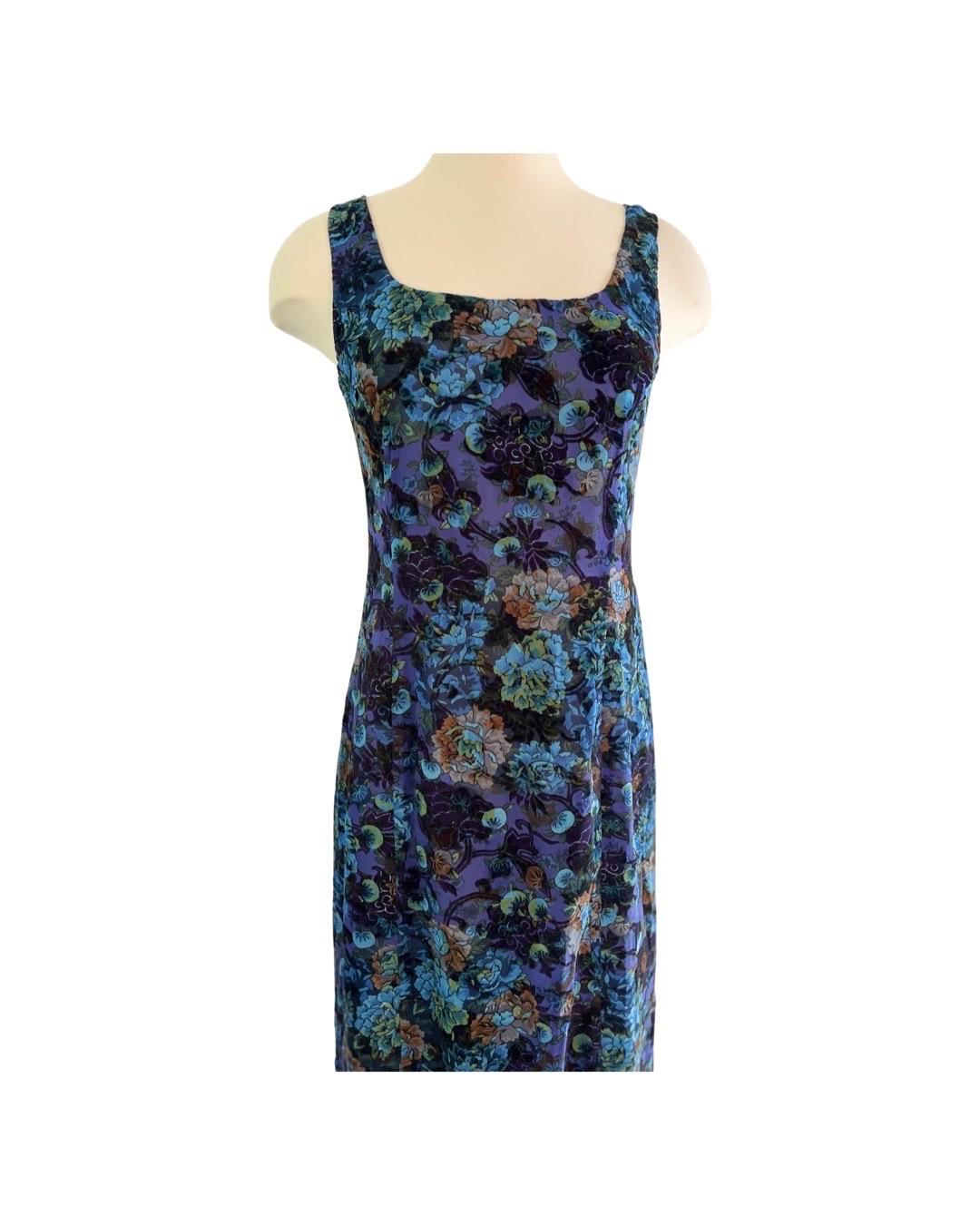 Wonderful Kenzo 90s silhouette dress in a deep blue velvet burnout silk with blueberry bushes for the print. Thick straps and round neckline with a zipper closure. Fully lined with a matching blue slip. Excellent condition.

Shoulder 14
Chest