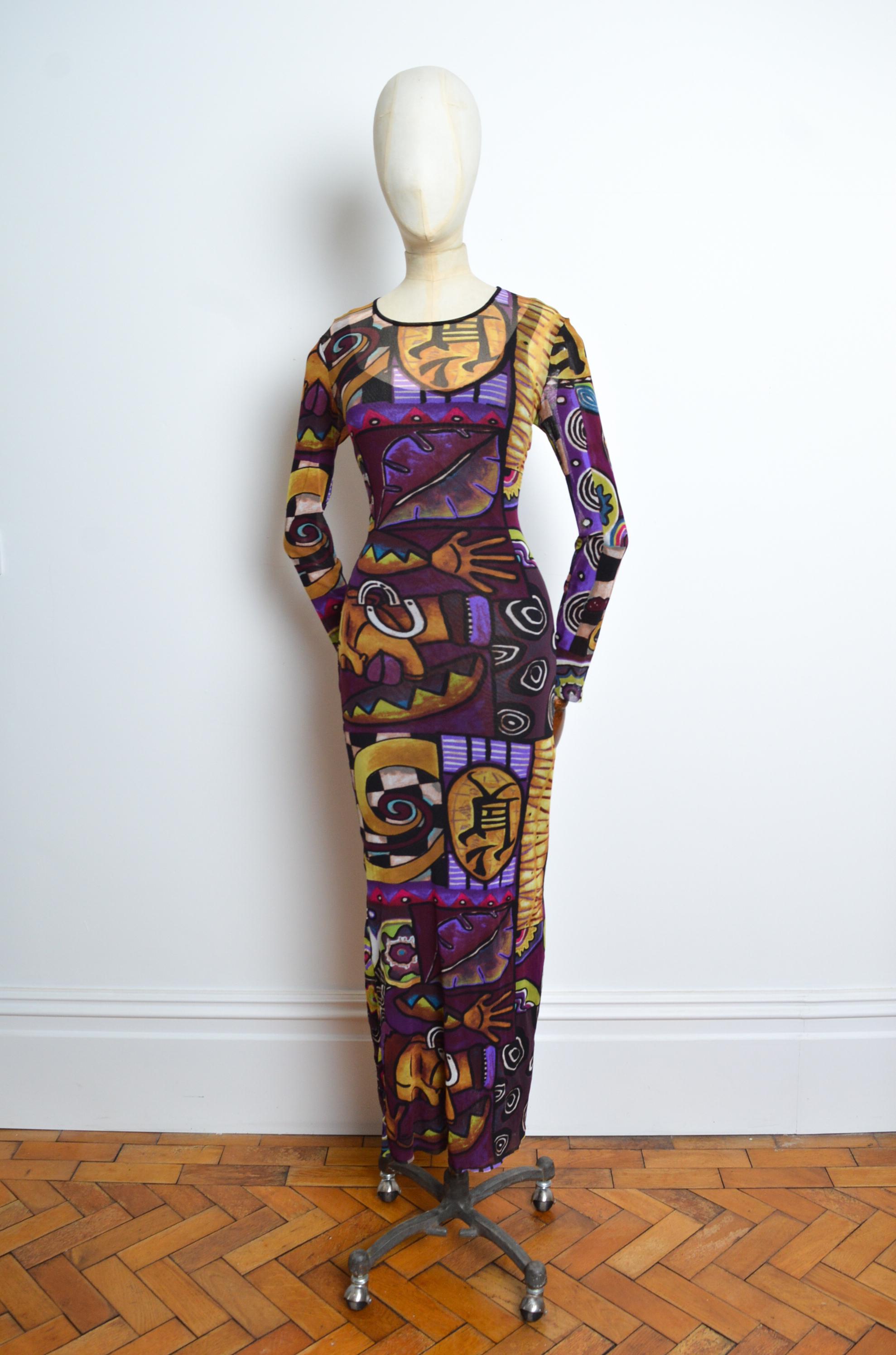Años 90 KENZO Micro Mesh Morado y multicolor estampado de arte abstracto maxi vestido de manga larga
Características: Vestido de manga larga de micromalla transparente superelástica, con slip negro transparente separado sujeto por una puntada en los