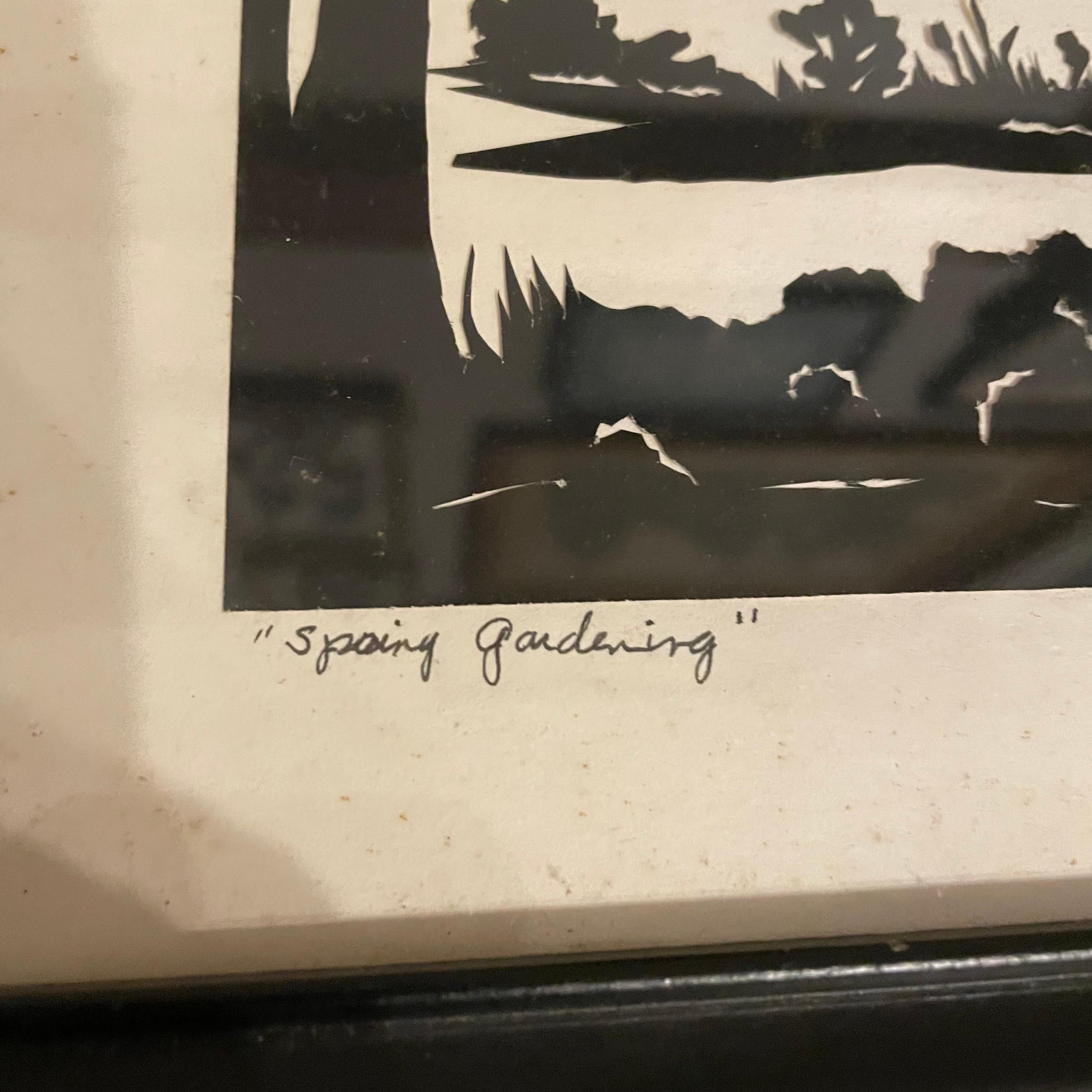 A genuine hand cut silhouette of a woman gardening. There is foxing on the white background of the piece. This can possibly be replaced or leave it as is. Could use a new frame as there are some dings on it. All of these issues are pictured.