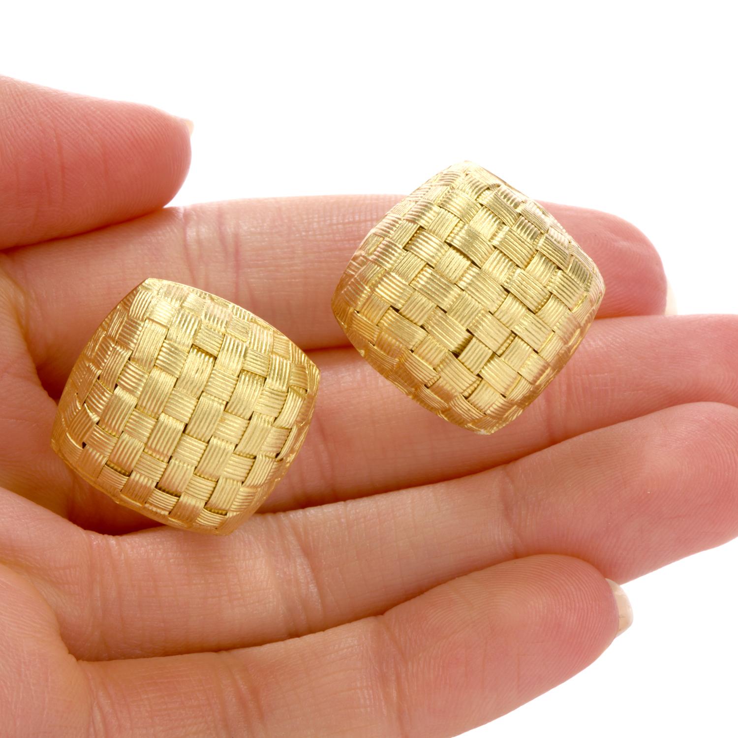 These understated, yet large earrings were fashioned

with a criss cross woven pattern and crafted

in 18K yellow gold.

Measuring appx. 22 x 22 x 10.5mm High, 

these earrings are large but understated with the carvings and matte design that

offer