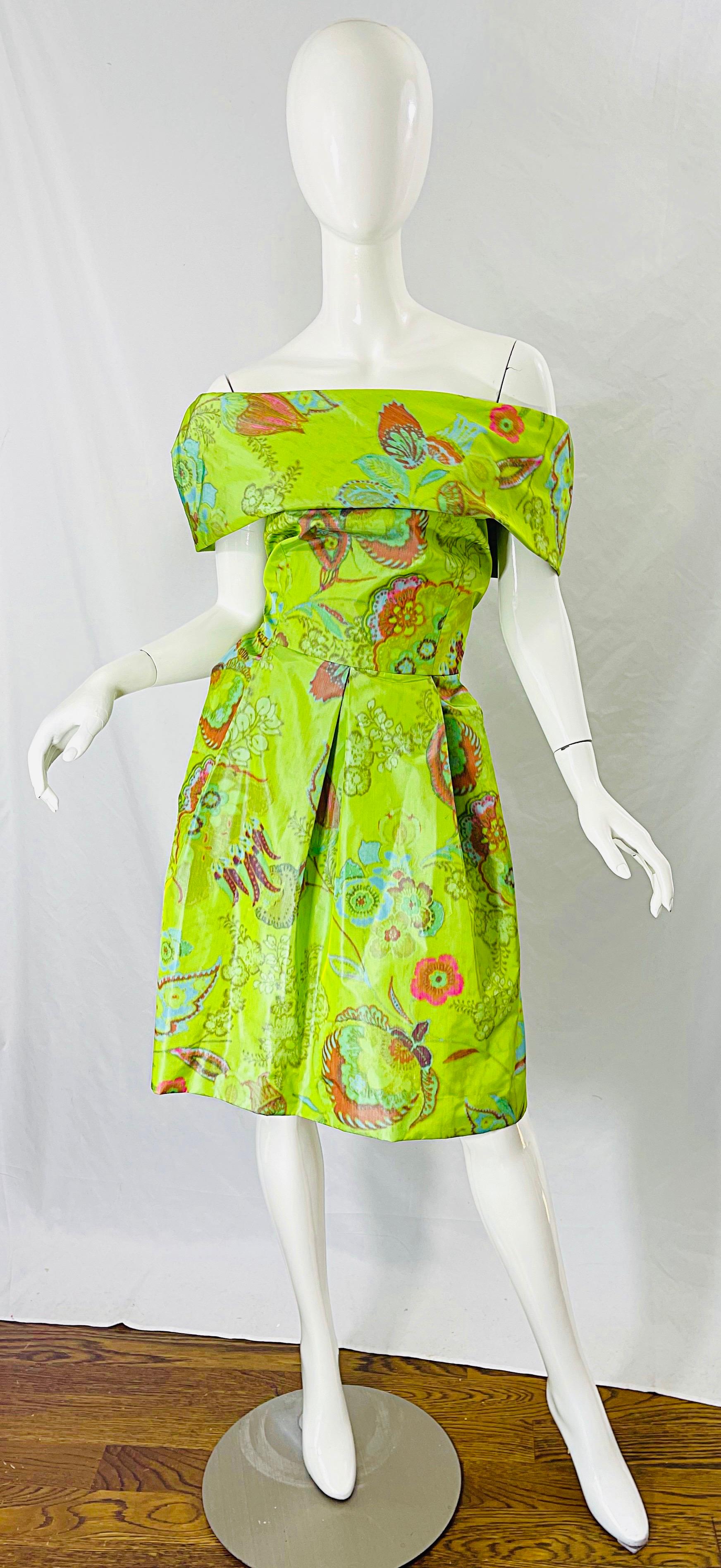 Gorgeous LEE ALEXANDER 90s silk taffeta off the shoulder neon green cocktail dress ! Features wonderful prints of flowers and paisley in blue, pink, and orange throughout. Hidden zipper up the back. Pockets at each side of the hips. Couture quality