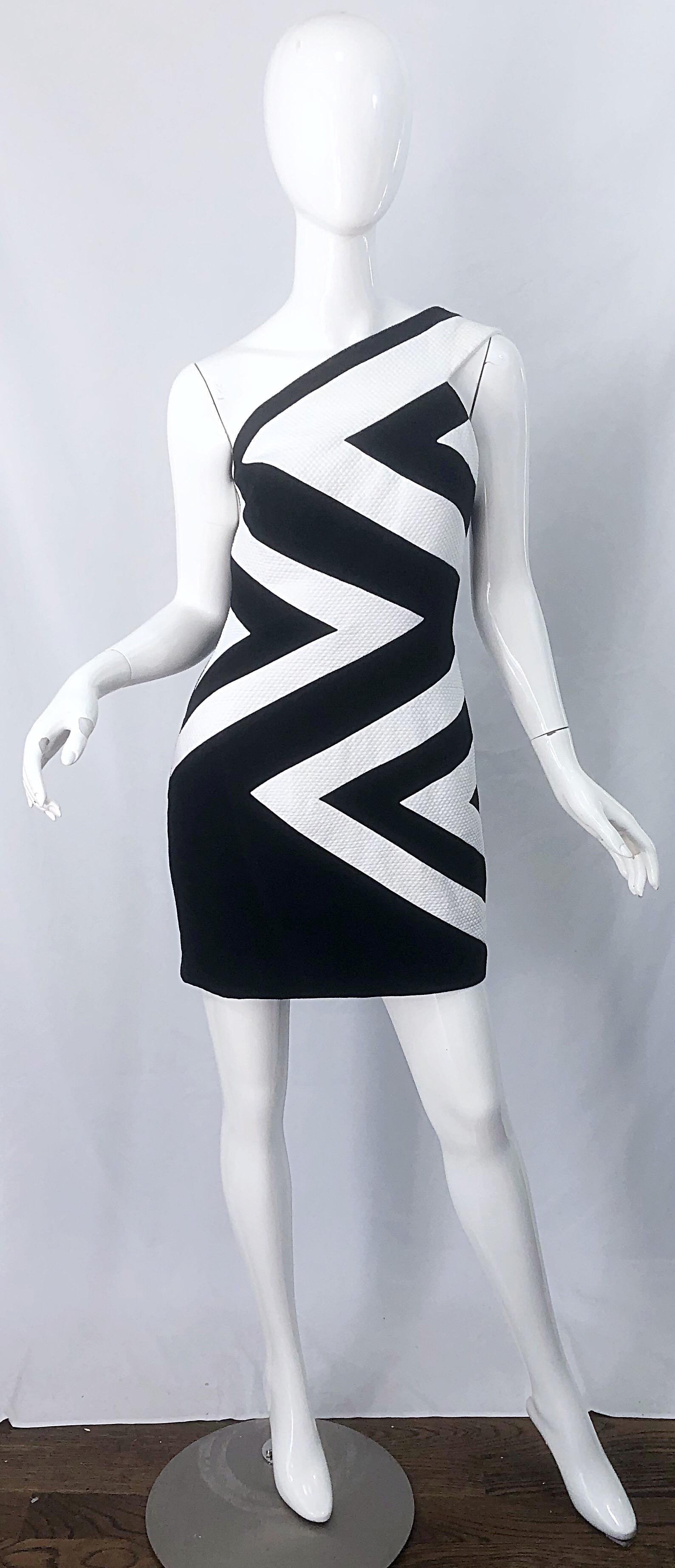 Sexy 1990s LINDA SEGAL black and white cotton picque one shoulder vintage mini dress ! Features a flattering zig zag print on the front with a solid black back. Linda Segal designed many pieces for Fran Drescher's character on the hit show, 