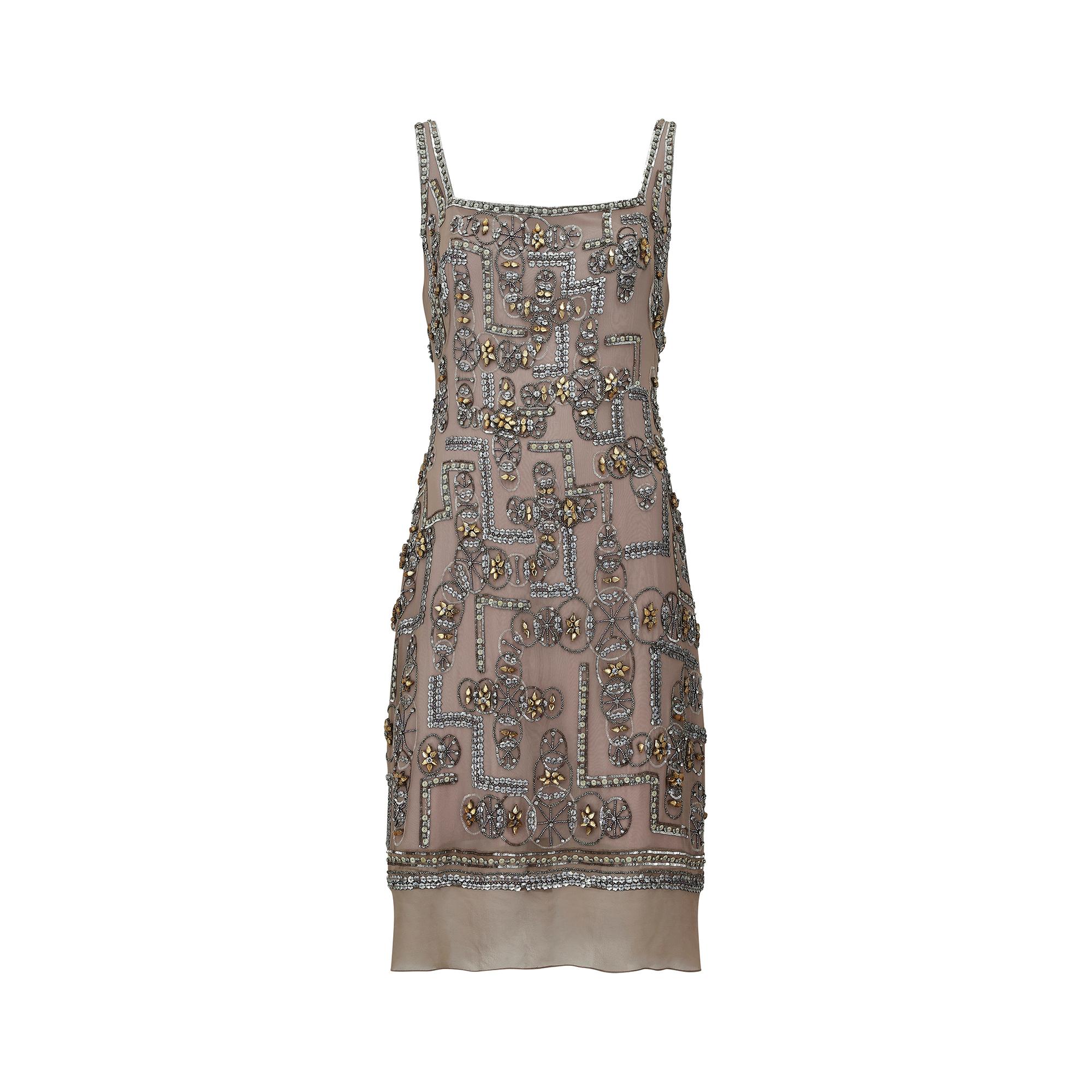 Late 1990s to 2000s Lindka Cierach couture beaded dress which takes some of its inspiration from the Art Deco and flapper style dresses of the early 1920s, with a distinctly modern flair. It has a lovely weight to it, reflective of both its quality