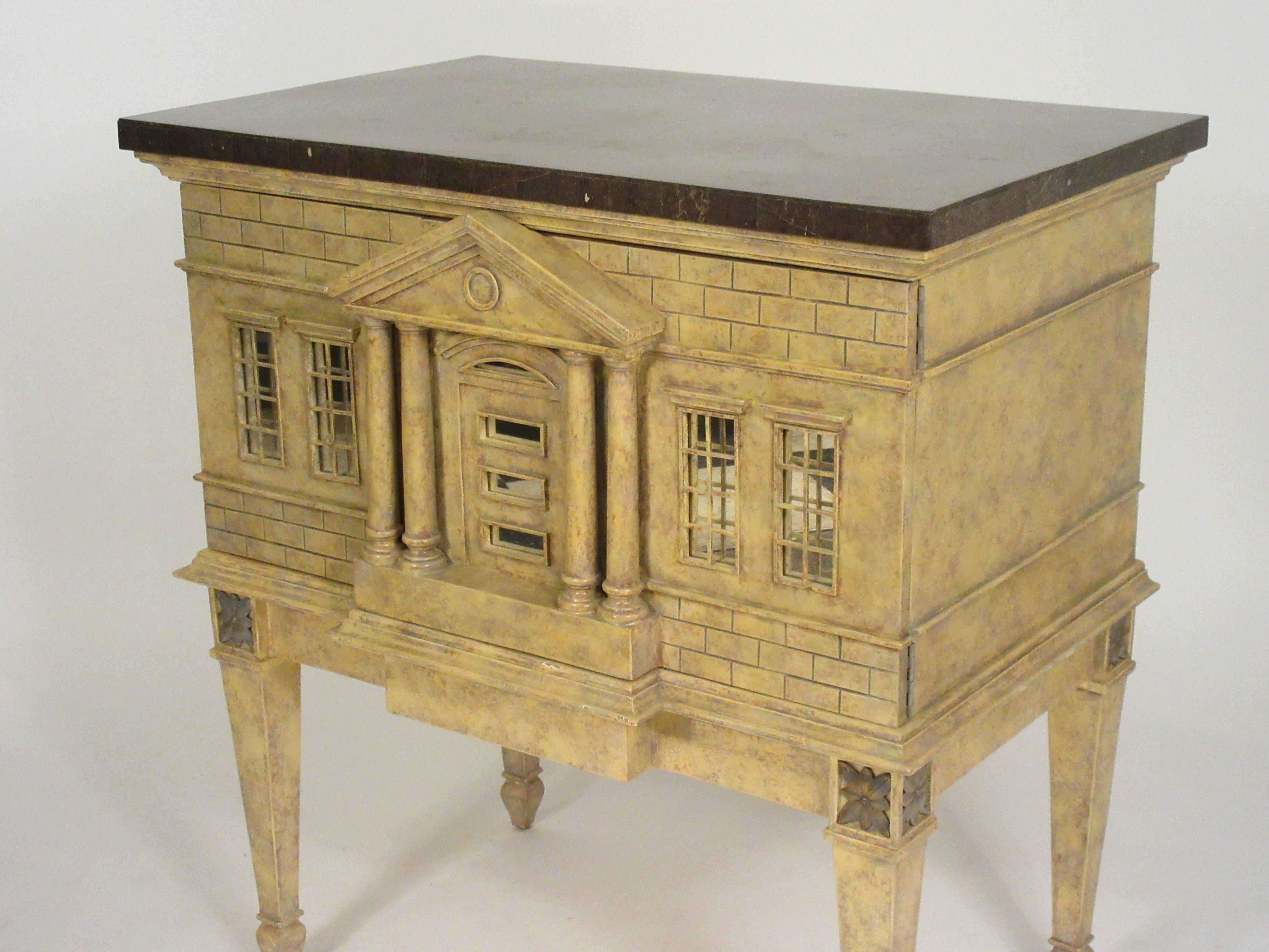 Unique chest, designed as a classical building stone top and brass accents.