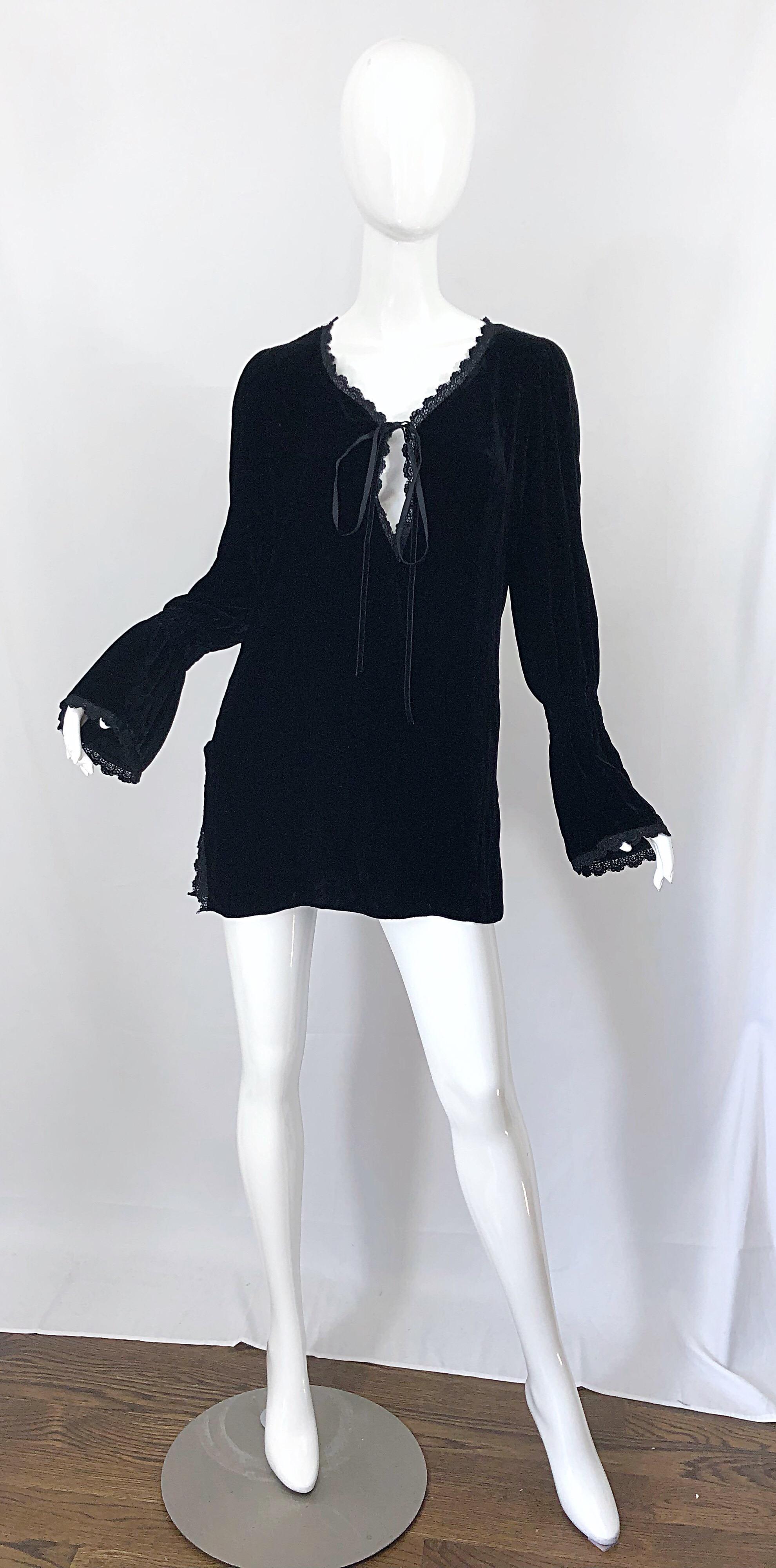 The perfect late 1990s LIZ JACOBSSON Paris black silk velvet poet sleeve tunic top / mini dress! Features a tie at center bust with embroidery trim, which is also at sleeve cuffs and hem. Bell sleeve with sligh elastic at mid arms. Slits at each