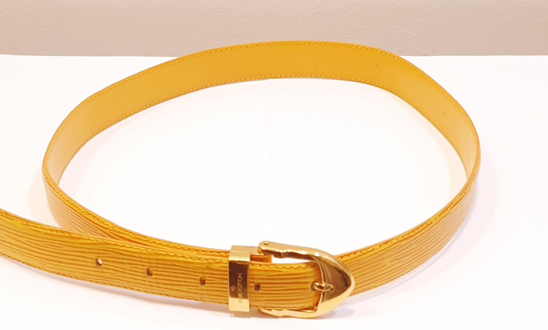 Louis Vuitton
Yellow Epi Leather Ceinture with Gold Buckle Belt
Size 70cm / 27,55 inches 5 blind stamp size settings to 80cm/ 31,56 inches - the largest fitting 32,67