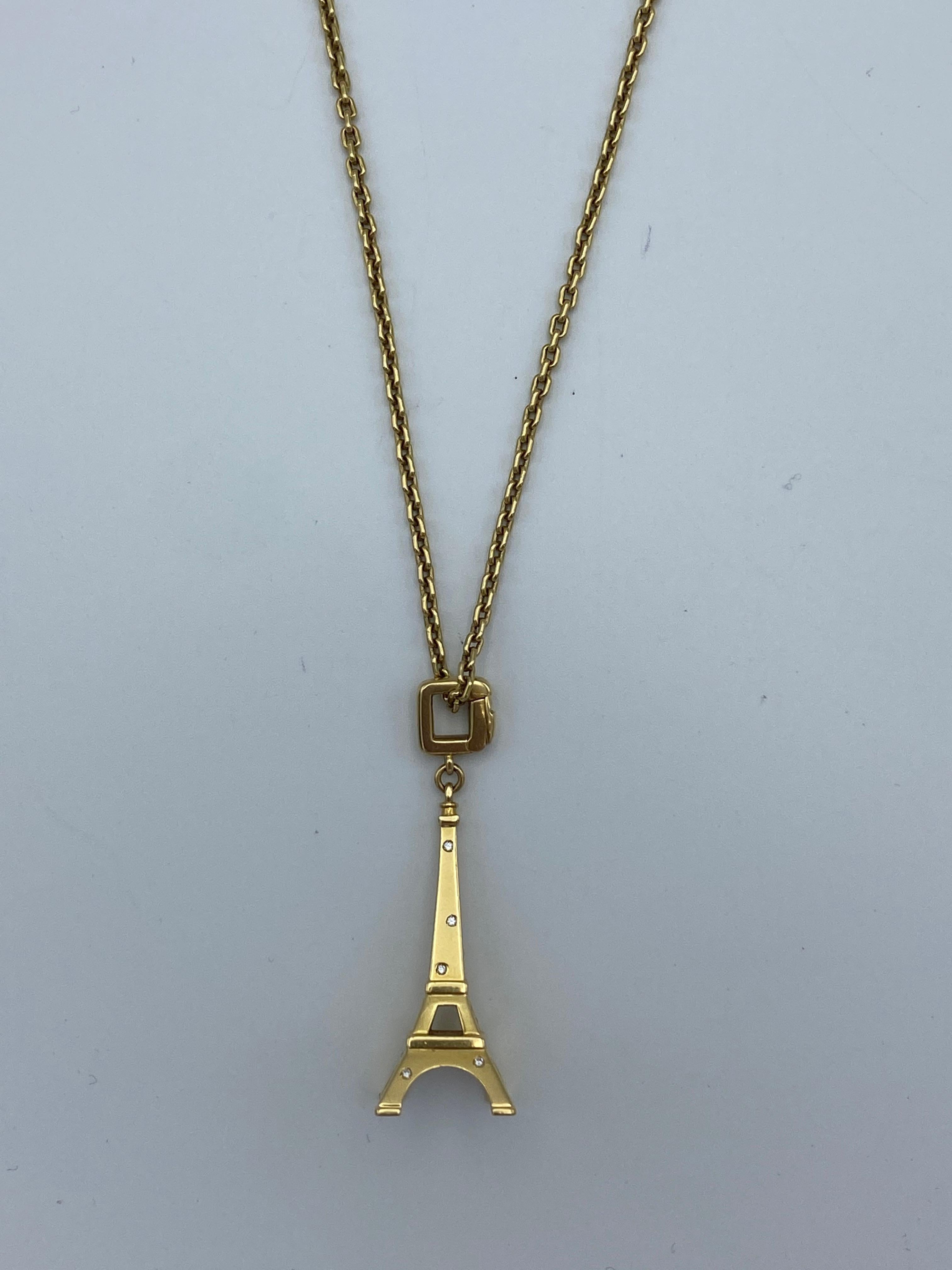 Product details:

The necklace is designed by Louis Vuitton and it is made out of 18 karat yellow gold, featuring boxed link chain necklace and Eiffel tower pendant with diamond detail.

Measurements: the chain is 20 inches long and 1/16