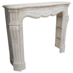 1990s Louis XV Style Antique Carved White Marble Fireplace.