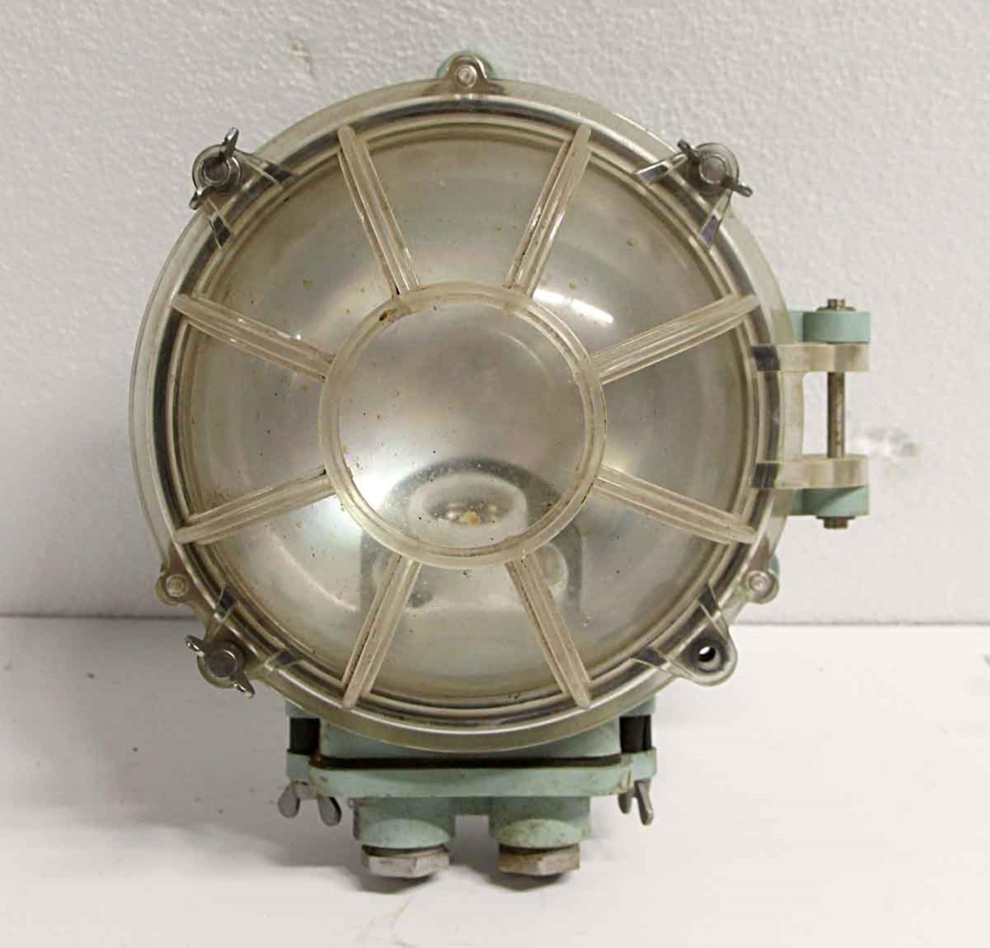 1990s green and clear Industrial Lucite face nautical wall sconce. Used on ships and boats. Cleaned and rewired. Small quantity available at time of posting. Priced each. Please inquire. Please note, this item is located in our Scranton, PA location.