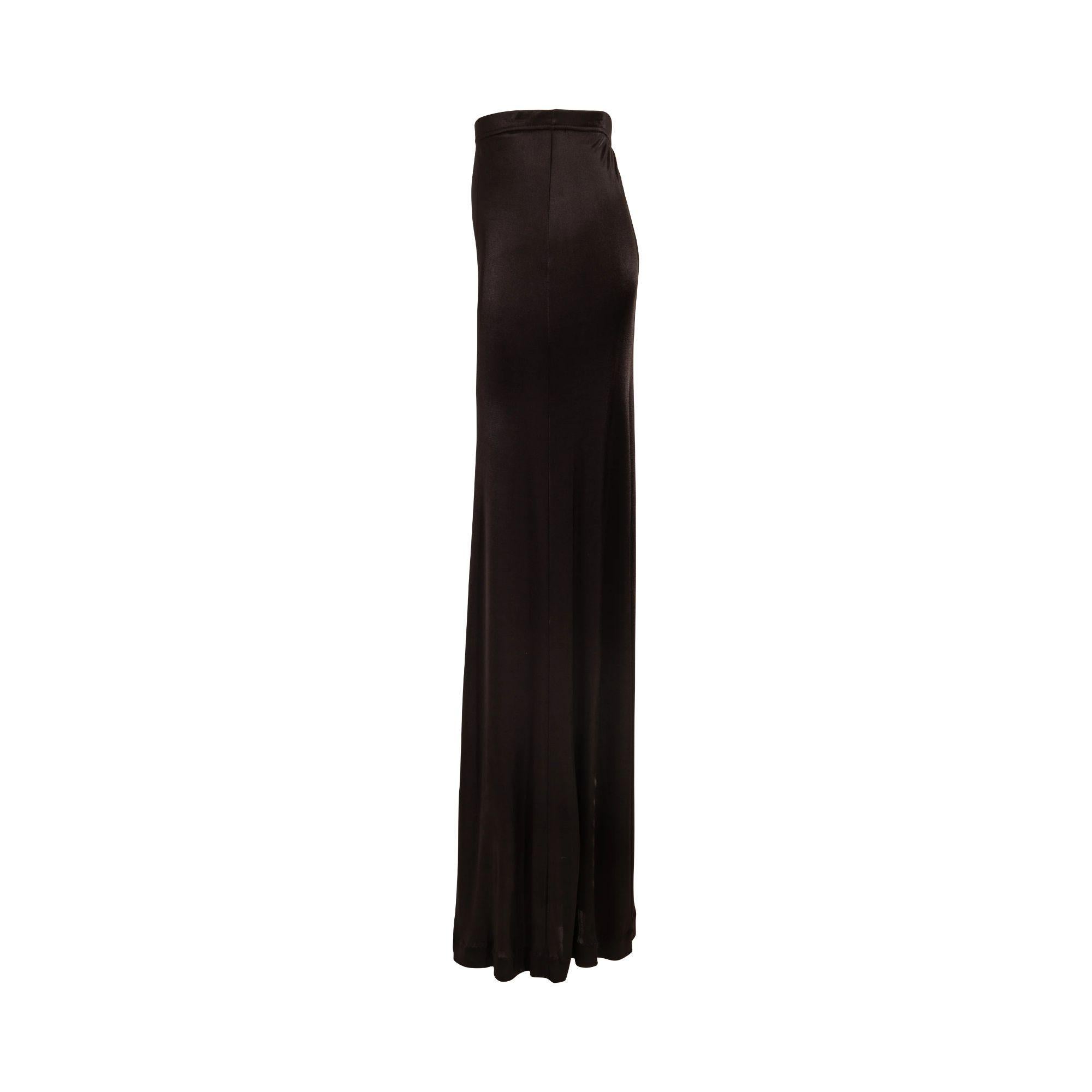 1990's Maison Margiela deep brown (nearly black) jersey skirt. A-line skirt with moderate stretch throughout. 100% Rayon. In very good vintage condition with light wear throughout. Stretch allows for wide range of sizing, with slight 'cowl' effect