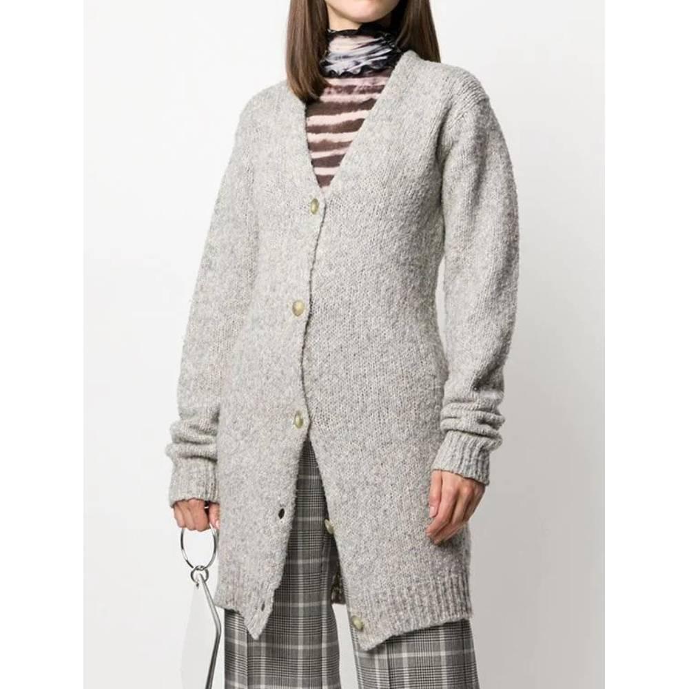 Maison Martin Margiela gray knitted wool long cardigan, button closure and V-neck, long sleeves, with knitted ribbed cuffs and hem

Years: 90s

Made in Italy

Size: S

Linear measures

Chest: 55 cm 
Shoulders: 45 cm 
Sleeves: 75 cm
Waist: 50 cm