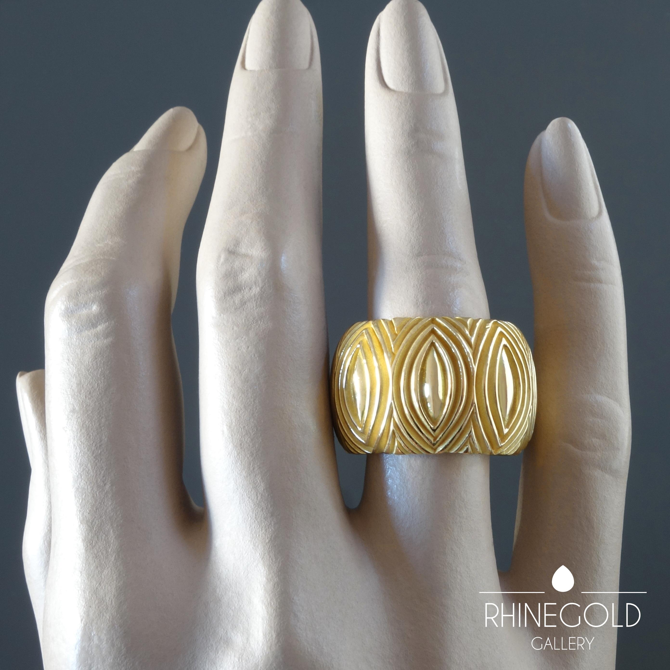 Majo Fruithof Modern Sculpted Gold Band Ring
18k yellow gold
Ring size: Ø  17.5 mm = EU 55.1 / US 7 1/4 / ASIA 14.5
Width of ring band 1.6 cm (approx. 5/8”)
Weight approx. 51.5 grams
Marks: maker’s mark; gold content mark ‘750’ for 18k