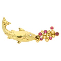 Mecan Elde Ruby and Diamond Fish Brooch Set in 18k Yellow Gold