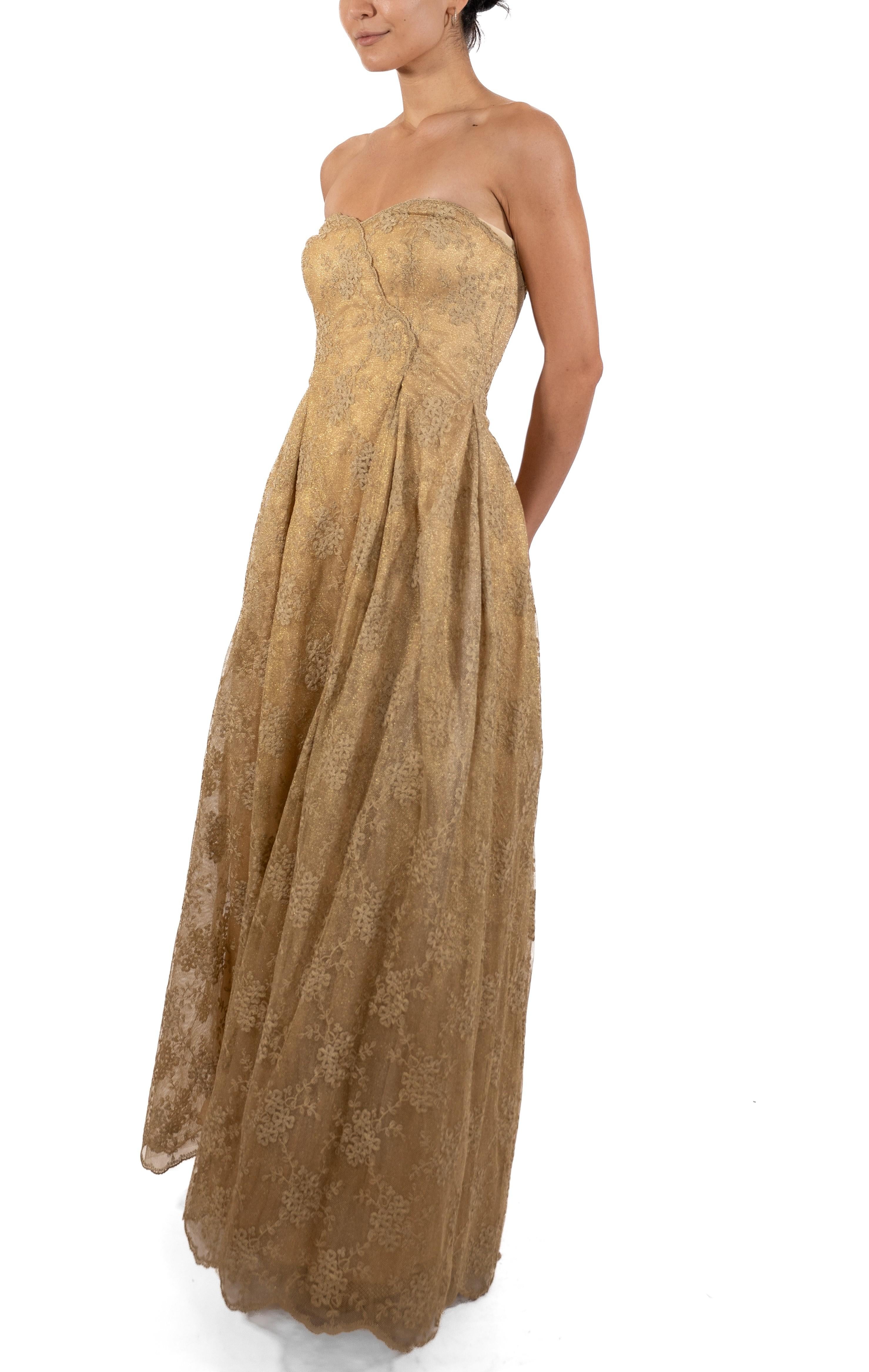This gown retains no label, however the amount of hand-finishing points to Haute Couture or custom made quality, fully lined in silk. 1990S Metallic Gold Silk Blend Lace Strapless Ball Gown 