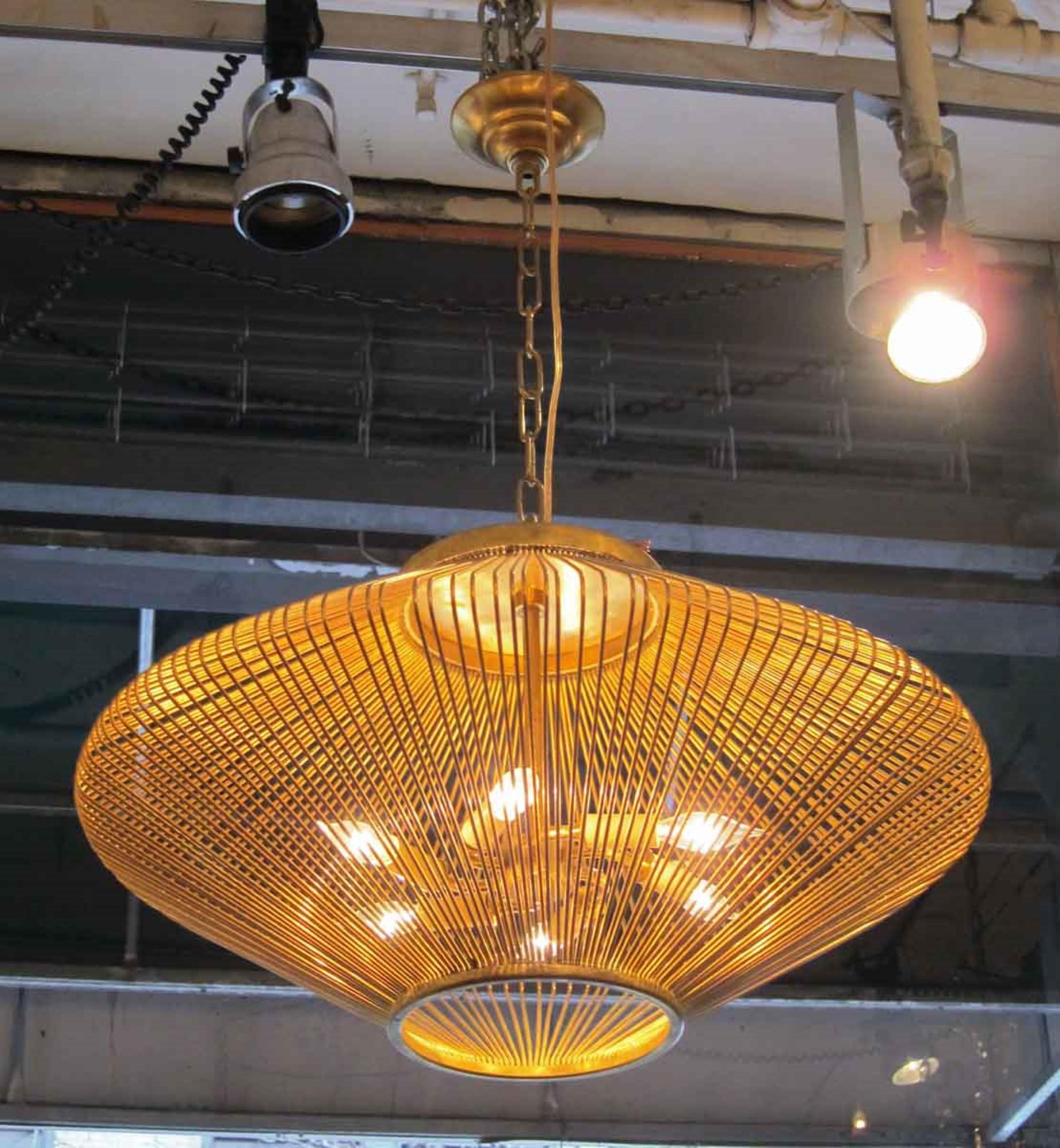 1990s Mid-Century Modern style diamond cage shaped pendant light done in a gold finish. Cleaned and wired. This light has 6 sockets. Small quantity available at time of posting. Please inquire. Priced each. Please note, this item is located in one