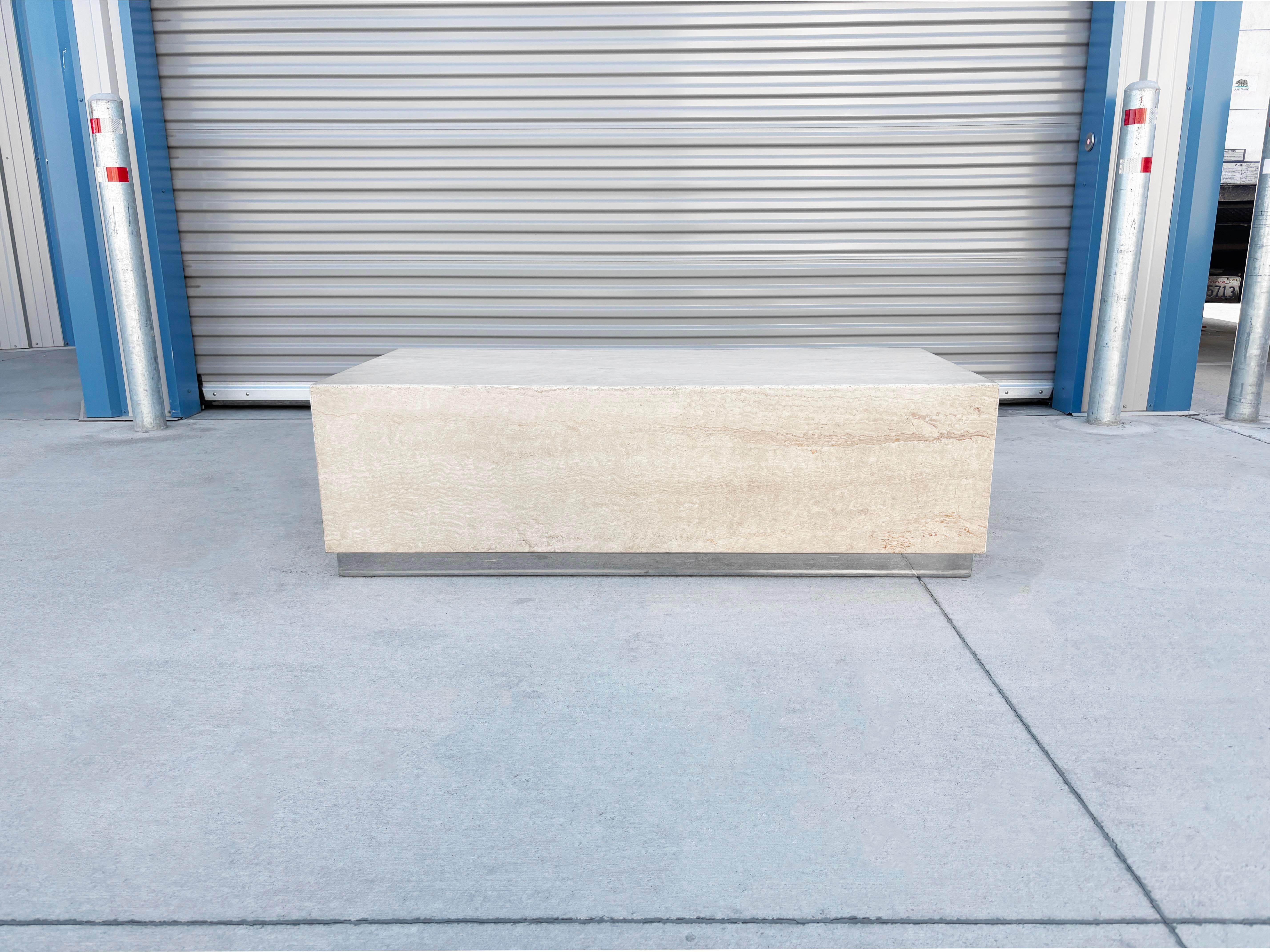 ✨ Mid-Century Travertine & Chrome Coffee Table ✨

Crafted in the United States, this stunning mid-century coffee table effortlessly blends natural beauty with sleek sophistication. The rectangular travertine top features striking, organic grain