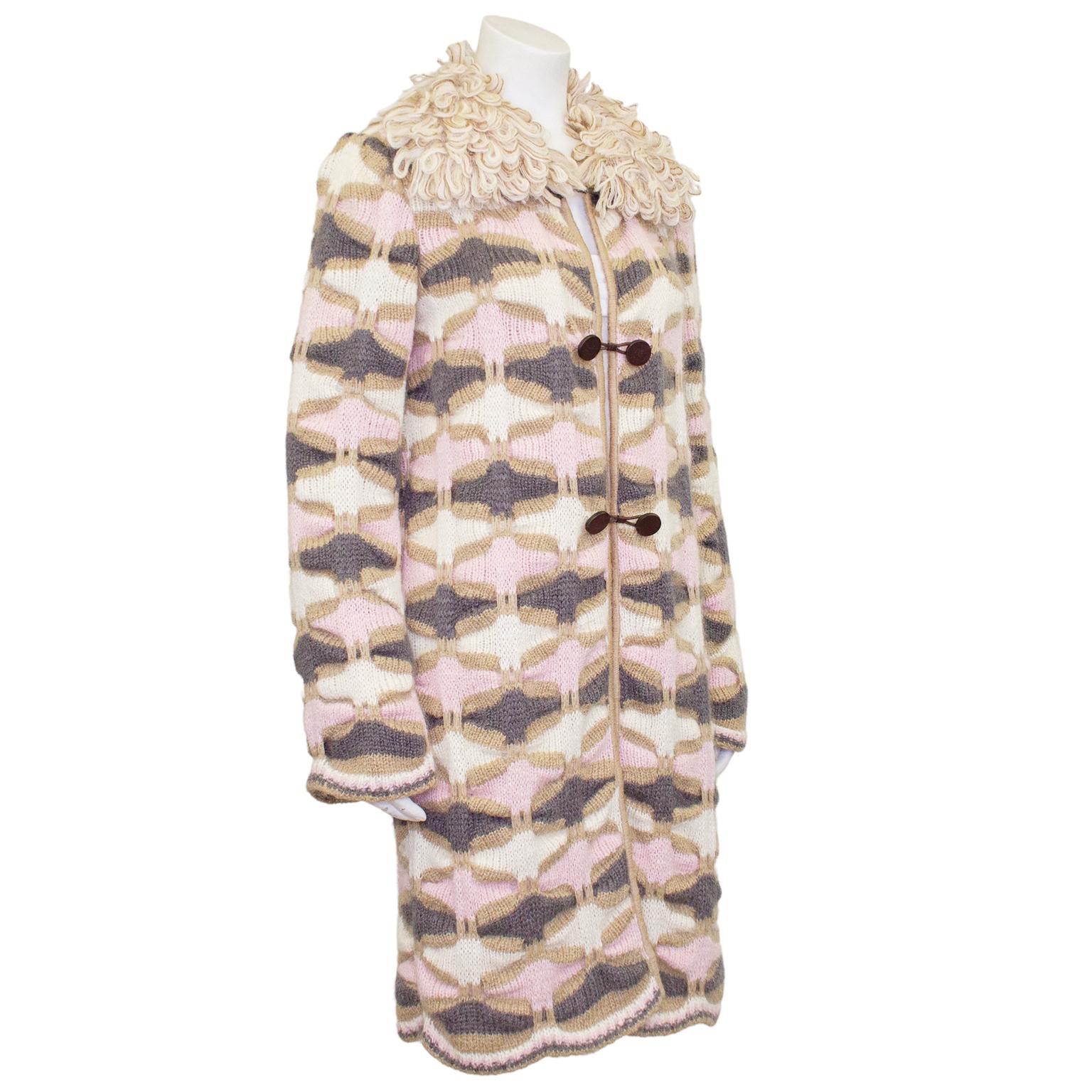 1990s Missoni knit car coat cardigan. Pale pink, cream, beige and grey patterned wool with an oversized beige and cream looped yarn collar. Brown leather toggle style buttons. Scallop edge at cuffs and hem, unlined. Perfect for Spring/Fall.