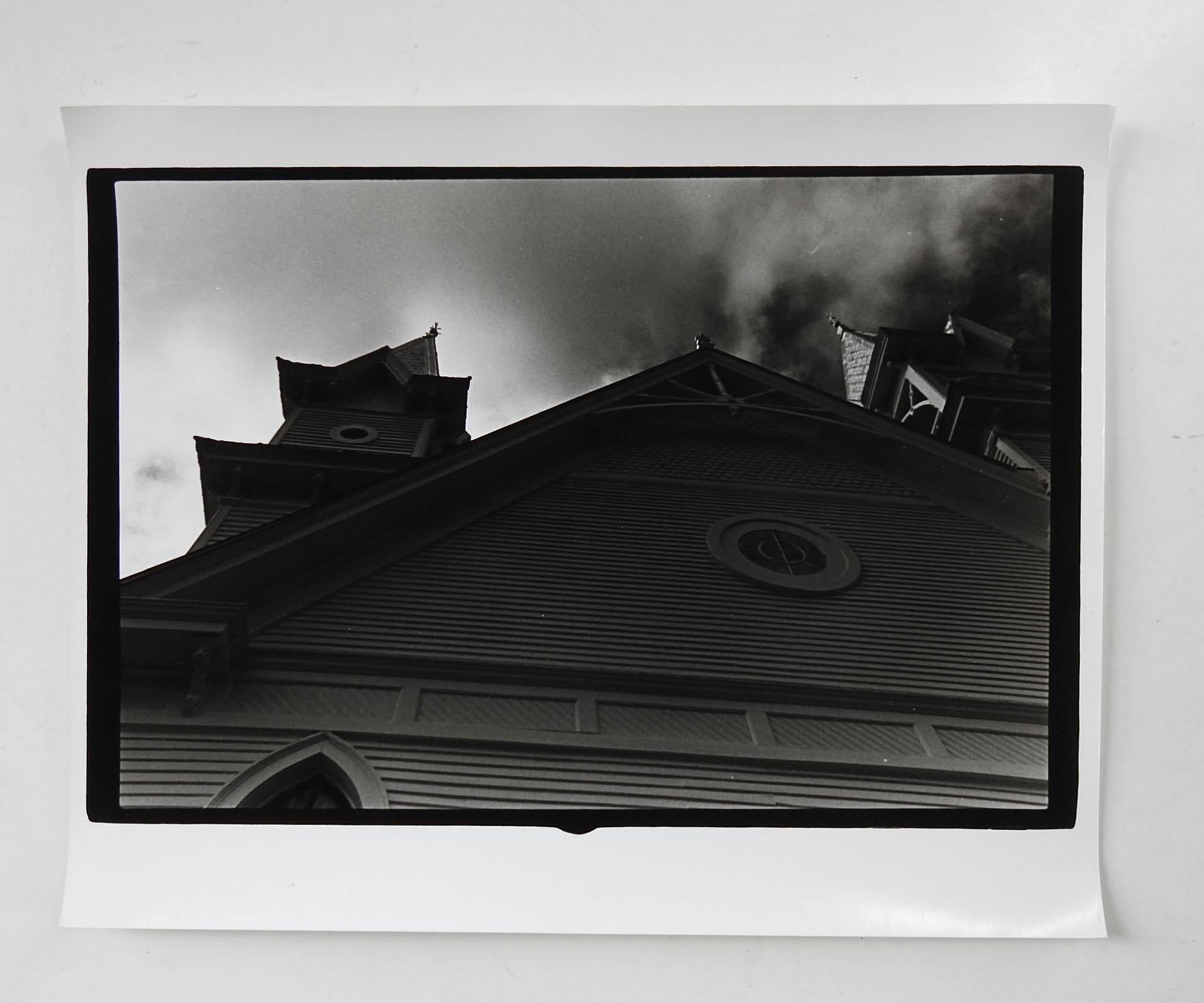 Vintage circa 1990's abstract angle photograph on heavy paper by Eric C. Weller (20th century) Texas.  Dark moody toned semi glossy photograph of old steepled church.  Unsigned,  Eric Weller was a professor of photography at Texas State University,