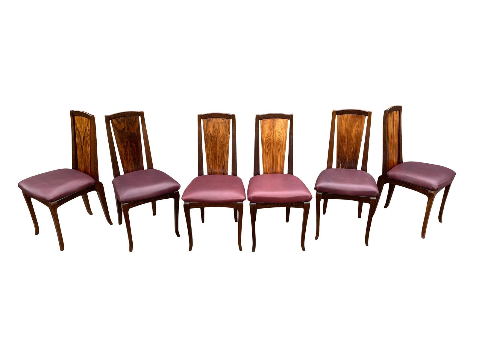 This 6 chairs are made of solid Morado Rosewood and Black African Wenge custom made in the manner of George Nakashima by Gary Fassler in the New Hope Pennsylvania área.