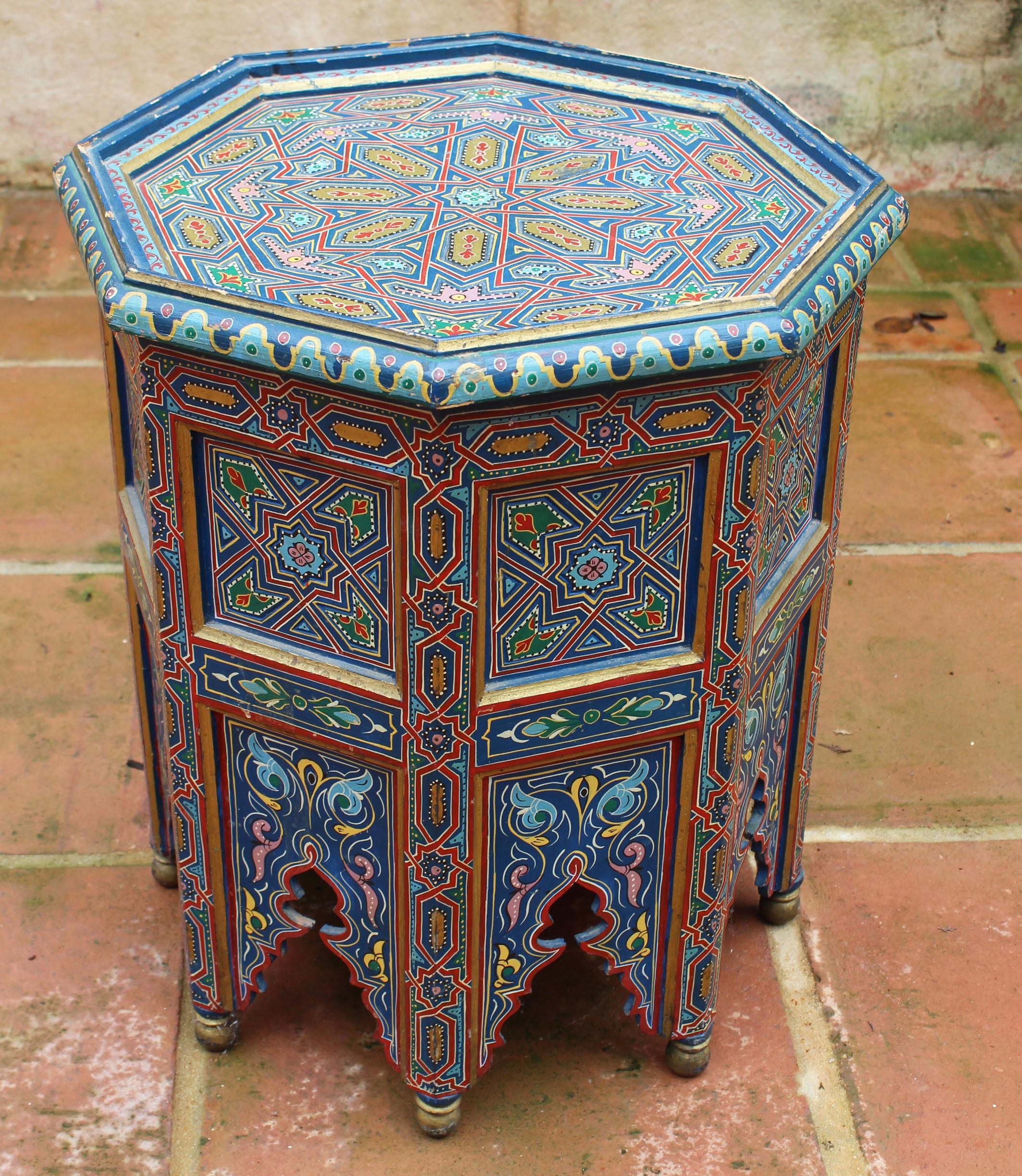 1990s Moroccan coffee table richly decorated in Arabic geometric motifs and colors.