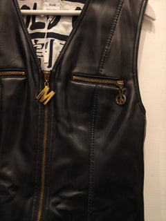 1990s Moschino black eco leather gold tone hardware "Sales, sold out" vest