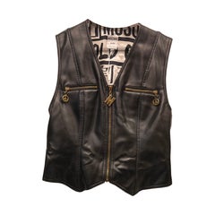 1990s Moschino black eco leather gold tone hardware "Sales, sold out" vest
