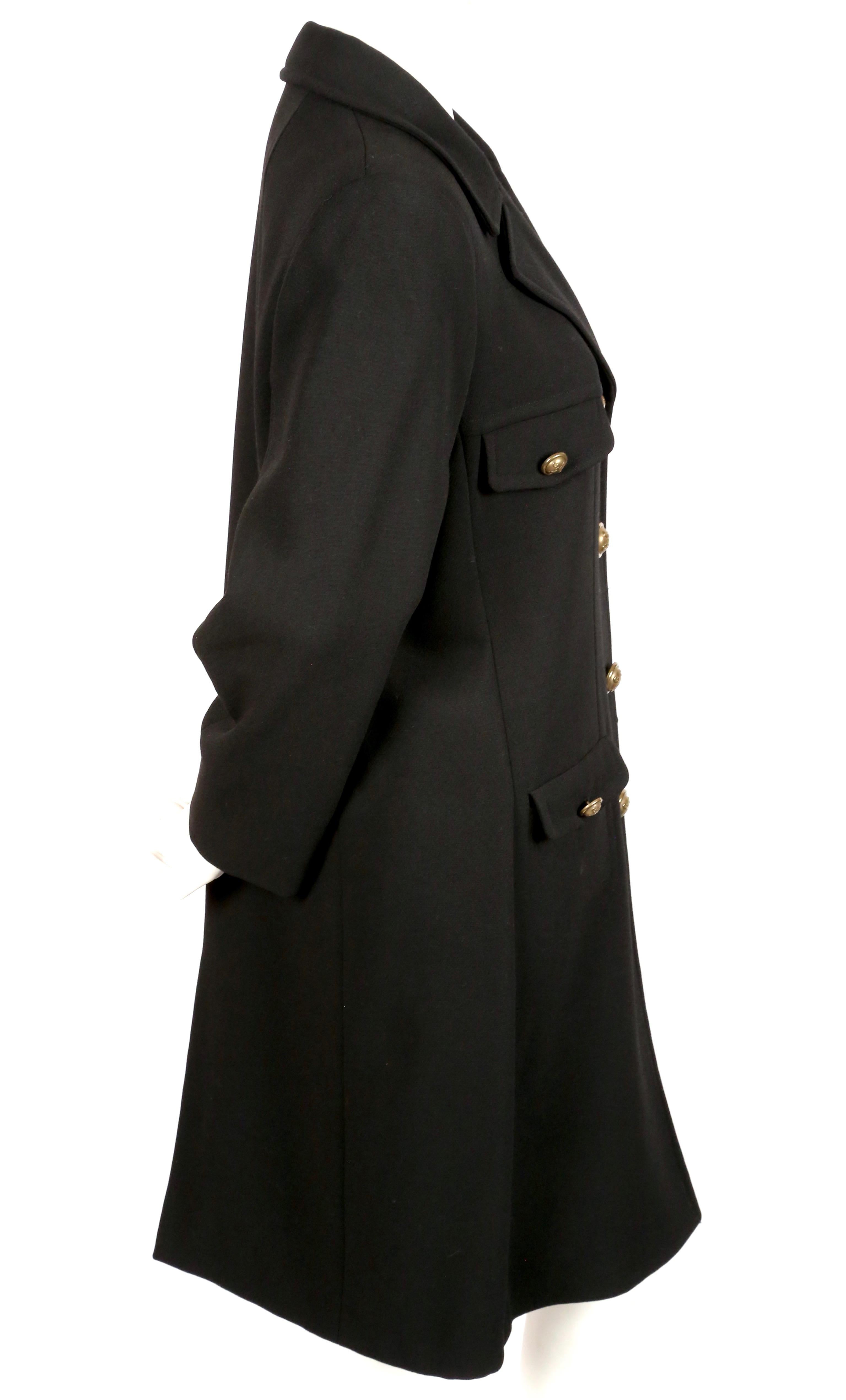 Jet black wool medium weight military coat from Moschino 'Cheap & Chic' dating to the 1990's. Italian size 40. Approximate measurements: shoulder 17