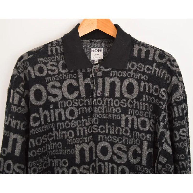 Vintage 1990's Iconic Moschino 'Off Key' fuzzy textured fleece top, in a grey & black colourway with repeat pattern through out. 

MADE IN ITALY

Features:
Button down collar
Long, cuffed sleeves
Iconic 'Off Key' print

40% Cotton / 40% Acrylic /