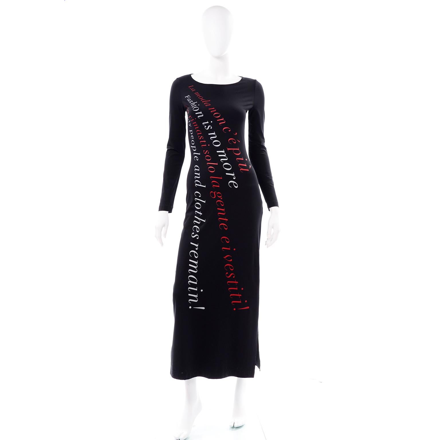 We are obsessed with this Moschino 1990's vintage black printed bodycon statement dress! This rare vintage Moschino nylon spandex dress is black with red Italian and white English printed diagonal text ;  Fashion is no More, Only People and Clothes