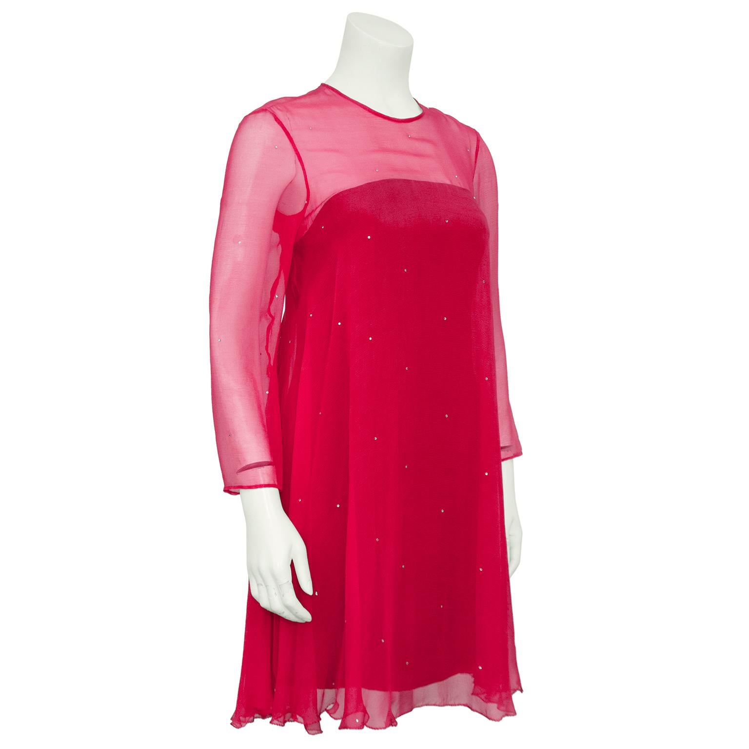 Stunning early 1990's coral chiffon swing dress by Myréne de Prémonville, a designer well known in France for her couture quality clothing. She represented a small group of couturiers that favored wearable and classic looks with unique fabrications