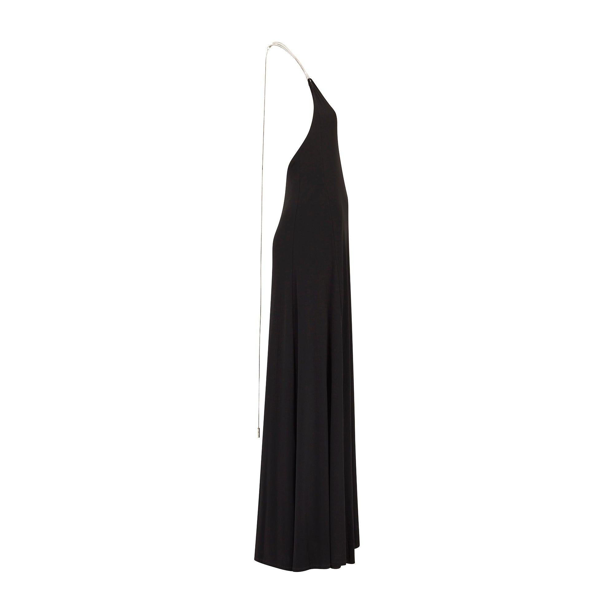 Made in the UK and designed by Nicole Fahri during the brand’s 1990s heyday, this floor-length slip dress is tailored from smooth inky black toned jersey. This elegant halter-neck piece exemplifies the brand’s signature understated-yet-luxurious