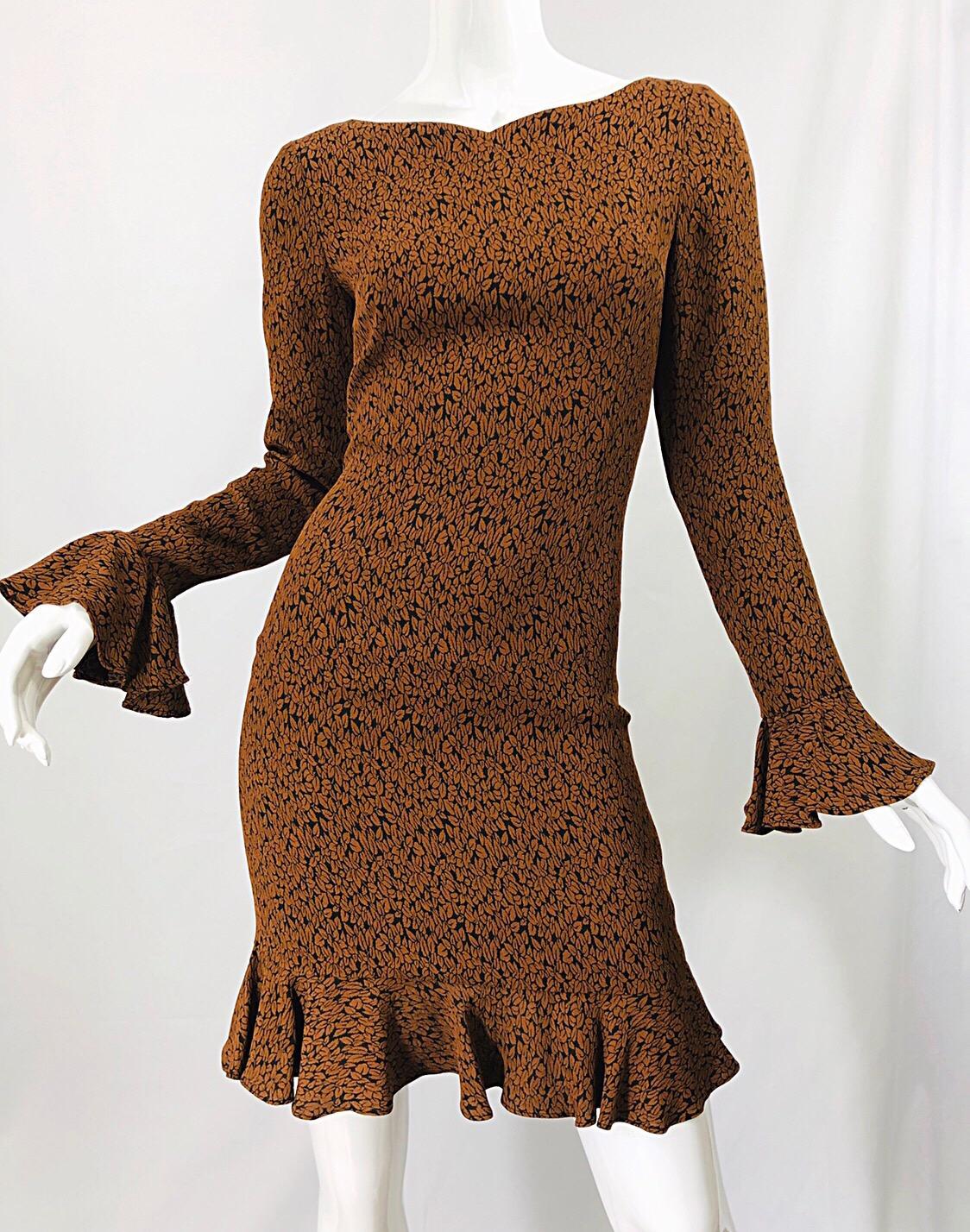 Chic vintage 90s NICOLE MILLER rust + brown leaf print bell sleeve rayon dress! Fitted bodice with a slight sweetheart neckline. Bell sleeves mirror the flirty ruffle hem. Hidden zipper up the back with hook-and-eye closure. Fully lined. Can easily