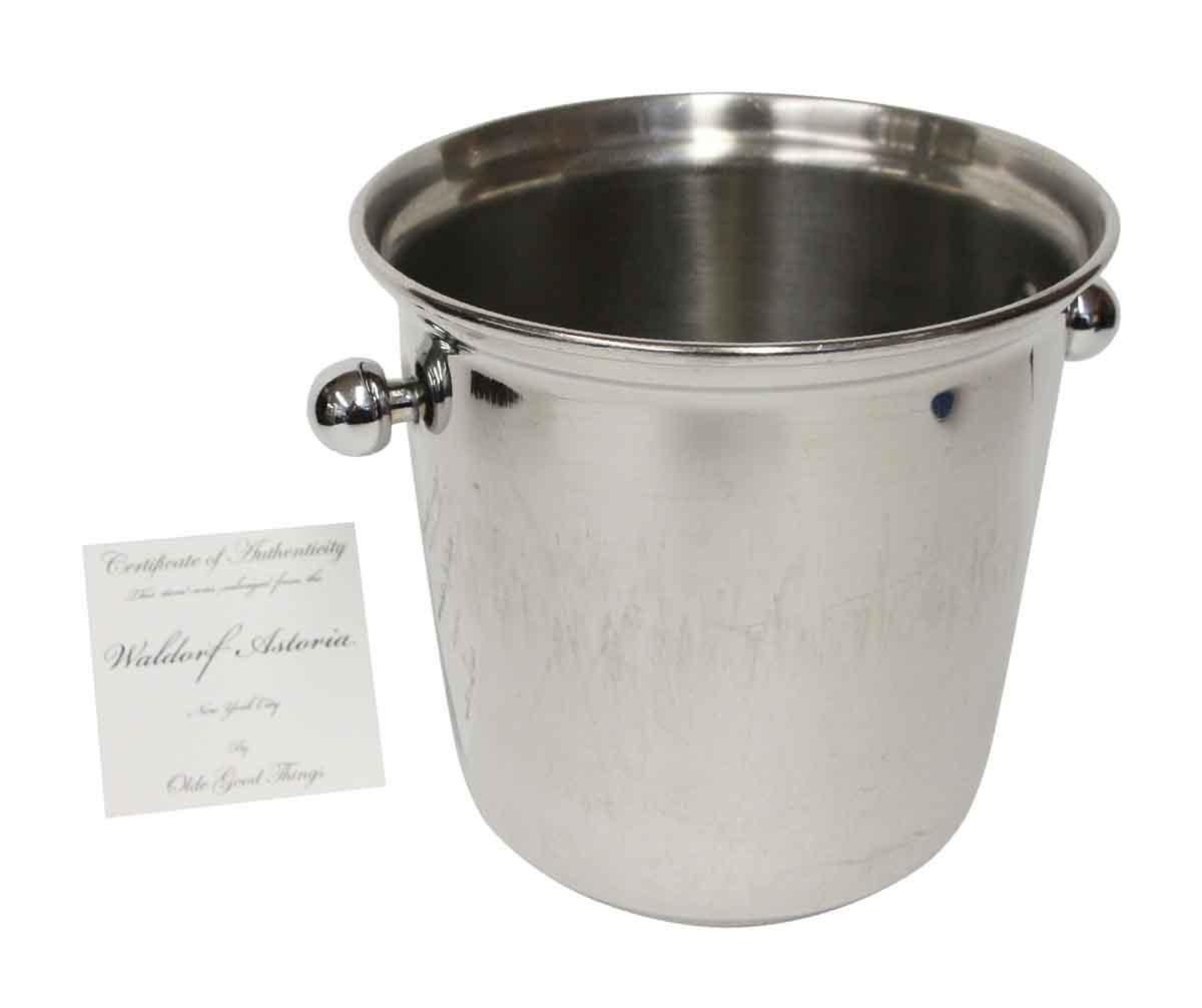 Made of brass in stainless finish by D.W. Haber & Son Inc. 1990s. This is an online exclusive style. All the buckets are scratched slightly from being stacked in the hotel. Waldorf Astoria authenticity card included with your purchase. Small