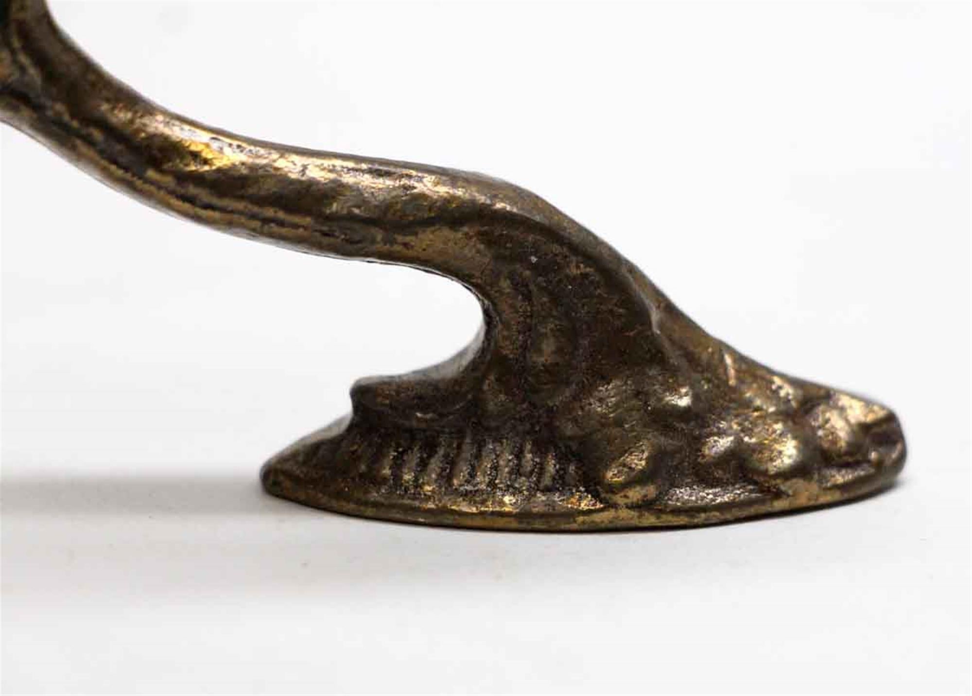 1990s bronze curtain tie back hooks in the shape of a swan. From the famous Waldorf Astoria in New York City. Priced each. Several available at time of posting. Please inquire. Waldorf Astoria authenticity card included with your purchase. This can