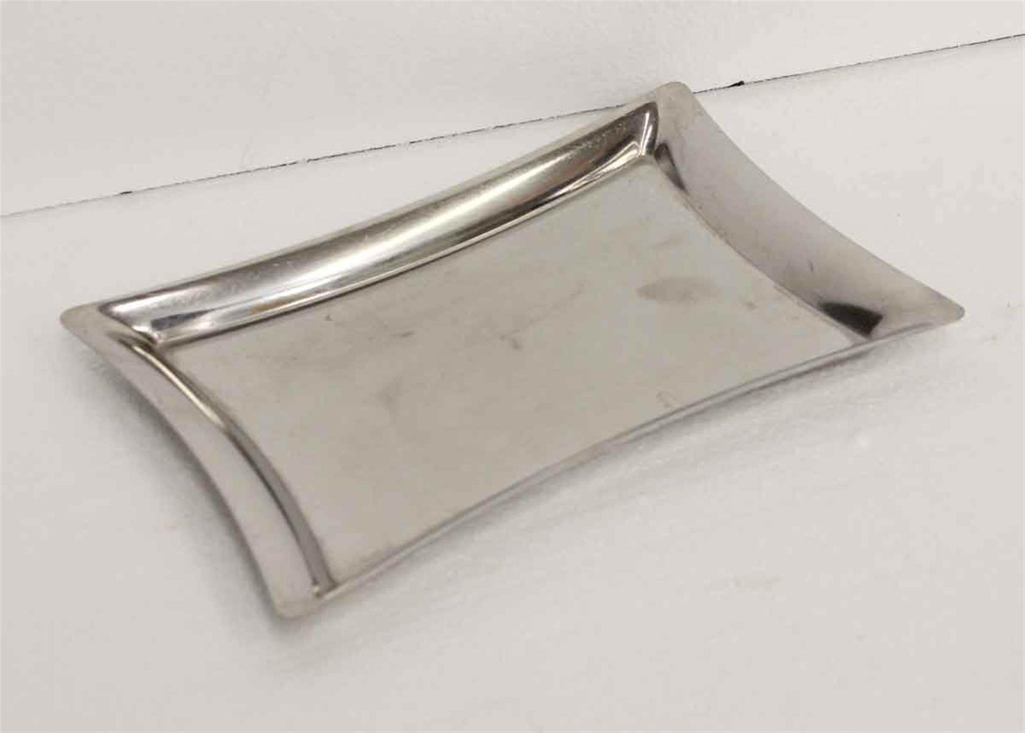 Sleek curved dish. Signed Bamboo Sambonet. A Waldorf Astoria authenticity card included with your purchase. Small quantity available at time of posting. Priced each. Small quantity available at time of posting. Please inquire. Priced each. Please
