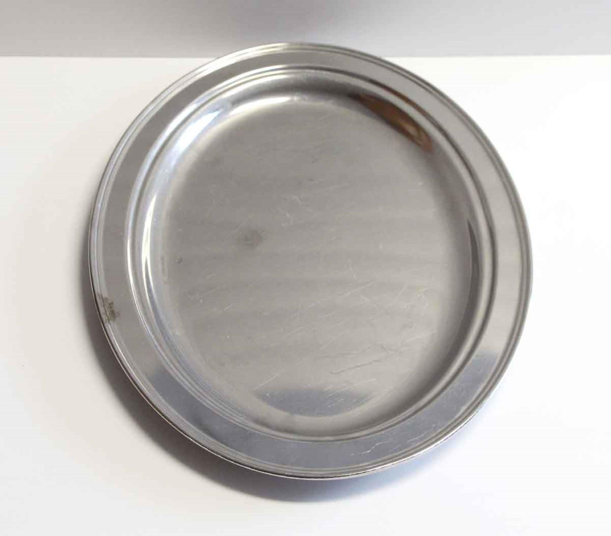 1990s stainless steel oval serving tray. From the NYC Waldorf Astoria Hotel Towers. Waldorf Astoria authenticity card included with your purchase. Small quantity available at time of posting. Please inquire. Priced each. This can be seen at our 400