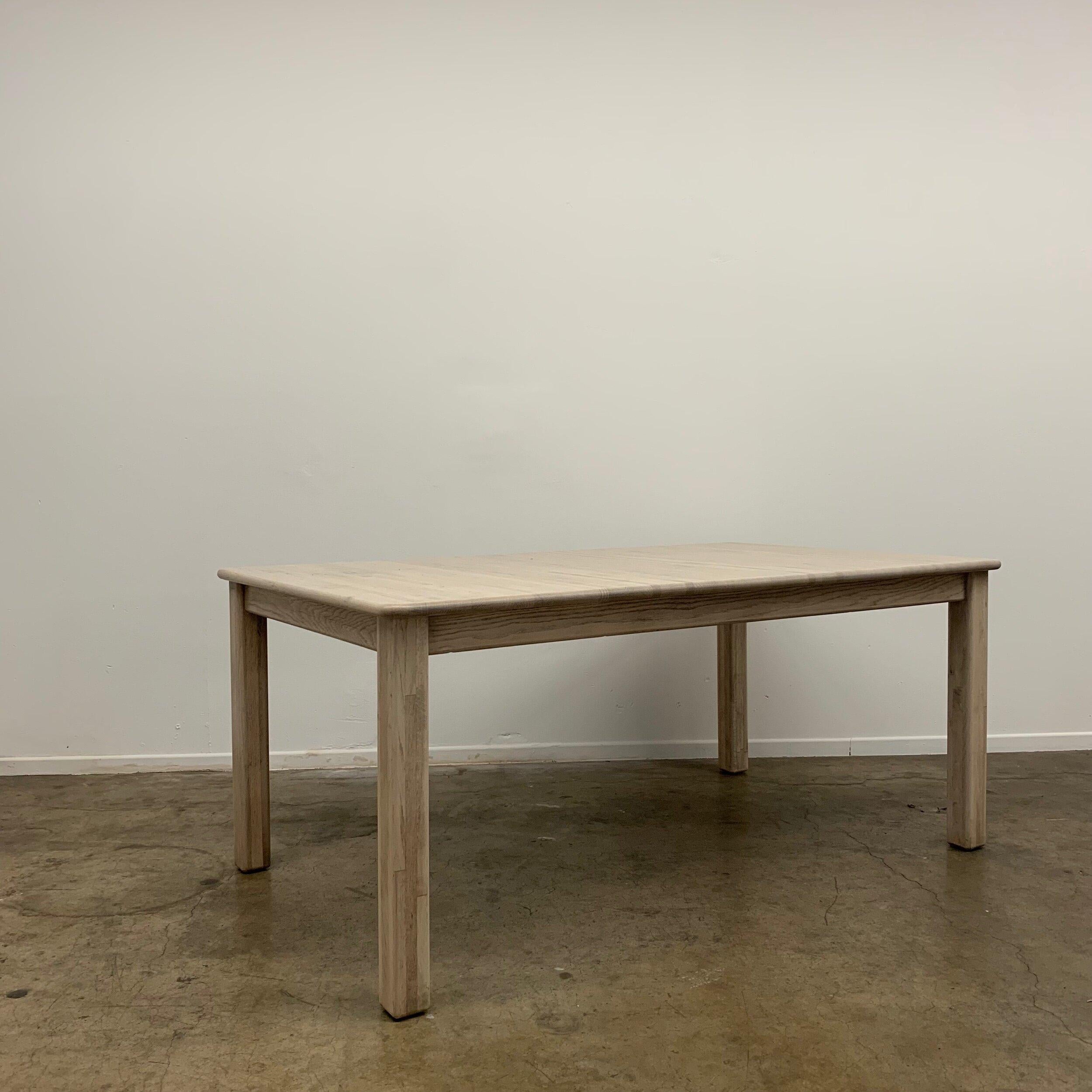 Vintage 90’s Oak Dining Table available in refinished condition. Made of solid oak this dining table is sturdy enough to seat a crowd of 6 to 8 people. No additional leafs. Standard design dining table focused on functionality and simplicity.