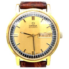 1990er Omega-Armbanduhr mit Datumsfunktion und goldfarbenem Etui