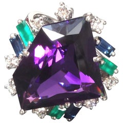 1990s Otto Klein 26 Carat Amethyst Diamond Sapphire Emerald Gold Cocktail Ring