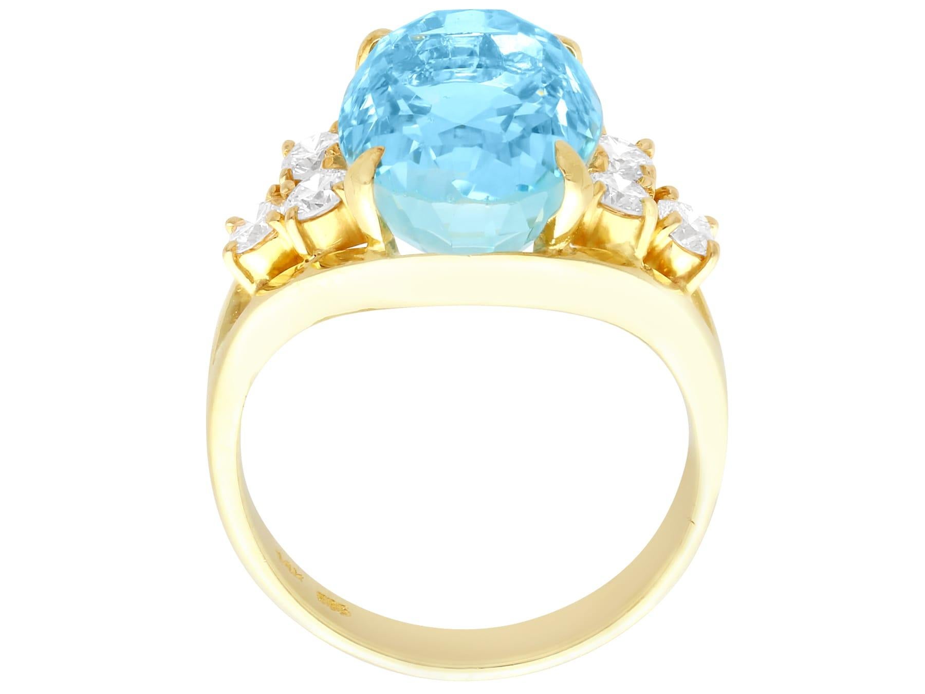 1990s Oval Cut Aquamarine and Diamond Yellow Gold Cocktail Ring For Sale 1