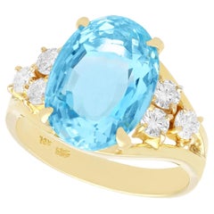 Vintage 1990s Oval Cut Aquamarine and Diamond Yellow Gold Cocktail Ring
