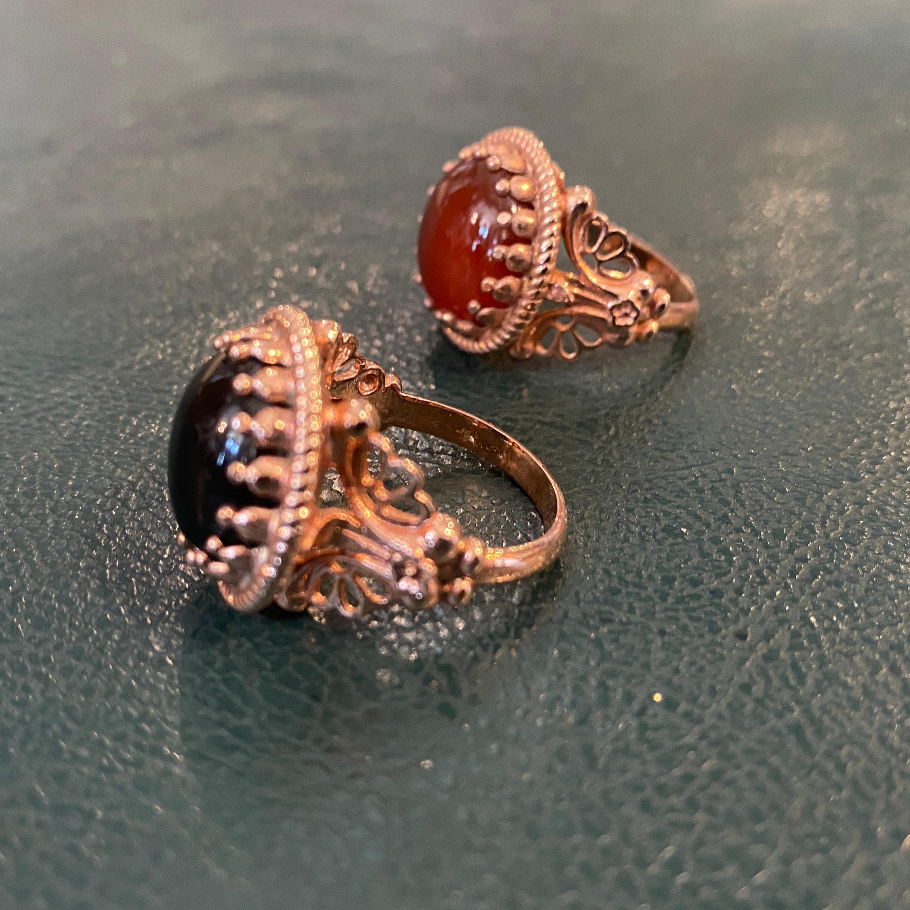 Retro 1990s Pair of  Bronze Onyx and Carnelian Italian Cocktail Rings by Anomis For Sale