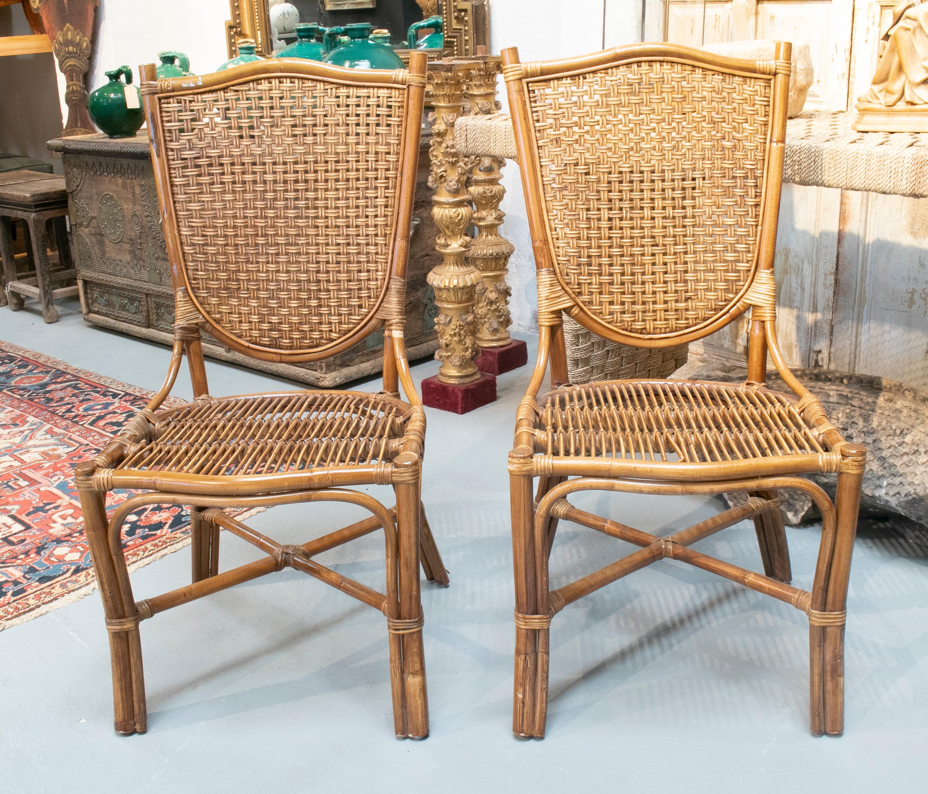 1990s pair of Spanish bamboo and wicker chairs.